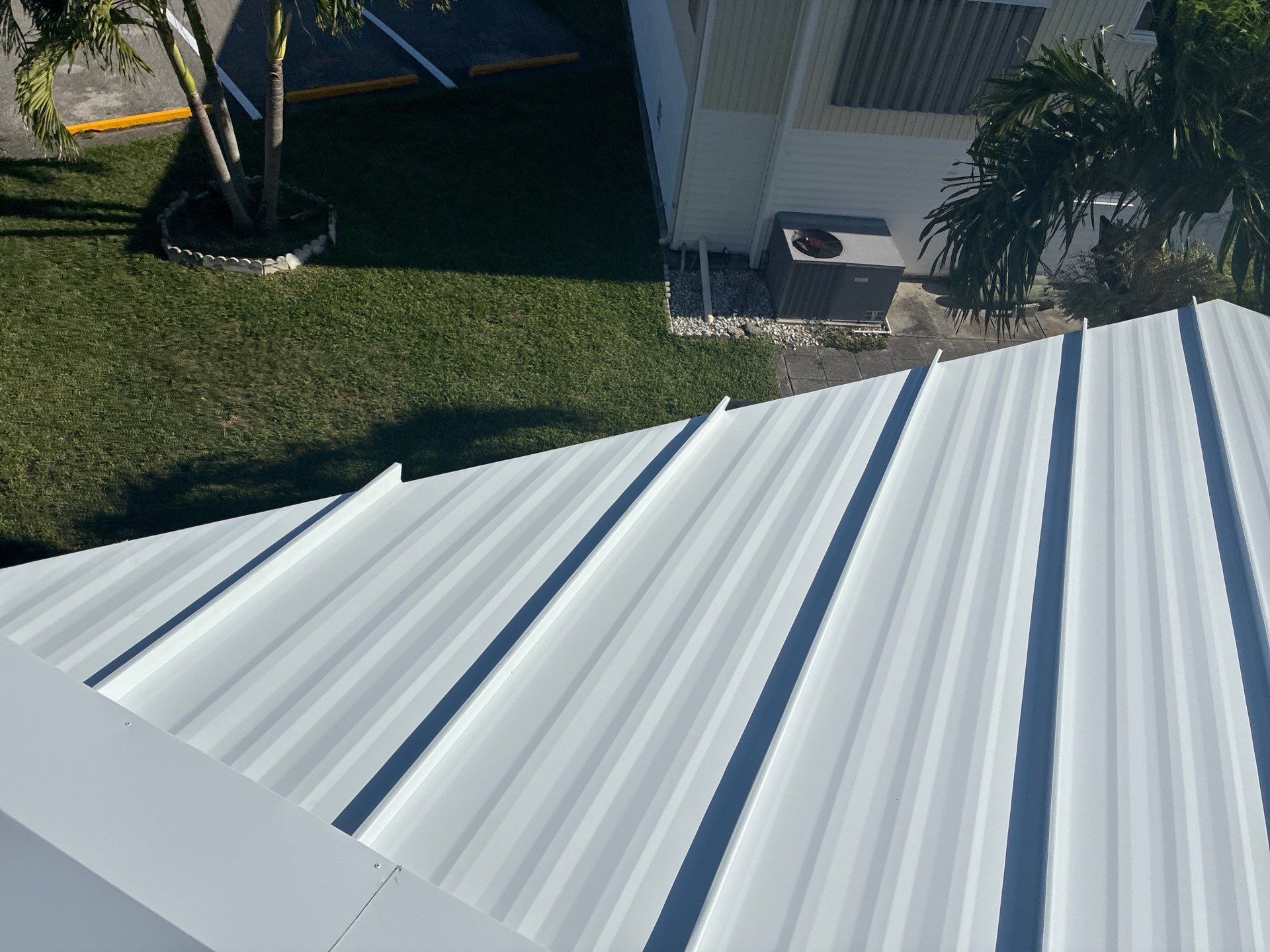 .032 Aluminum 1.5" Mechanical Seam Regal White  by Total Roofing System The Metal Roof Experts