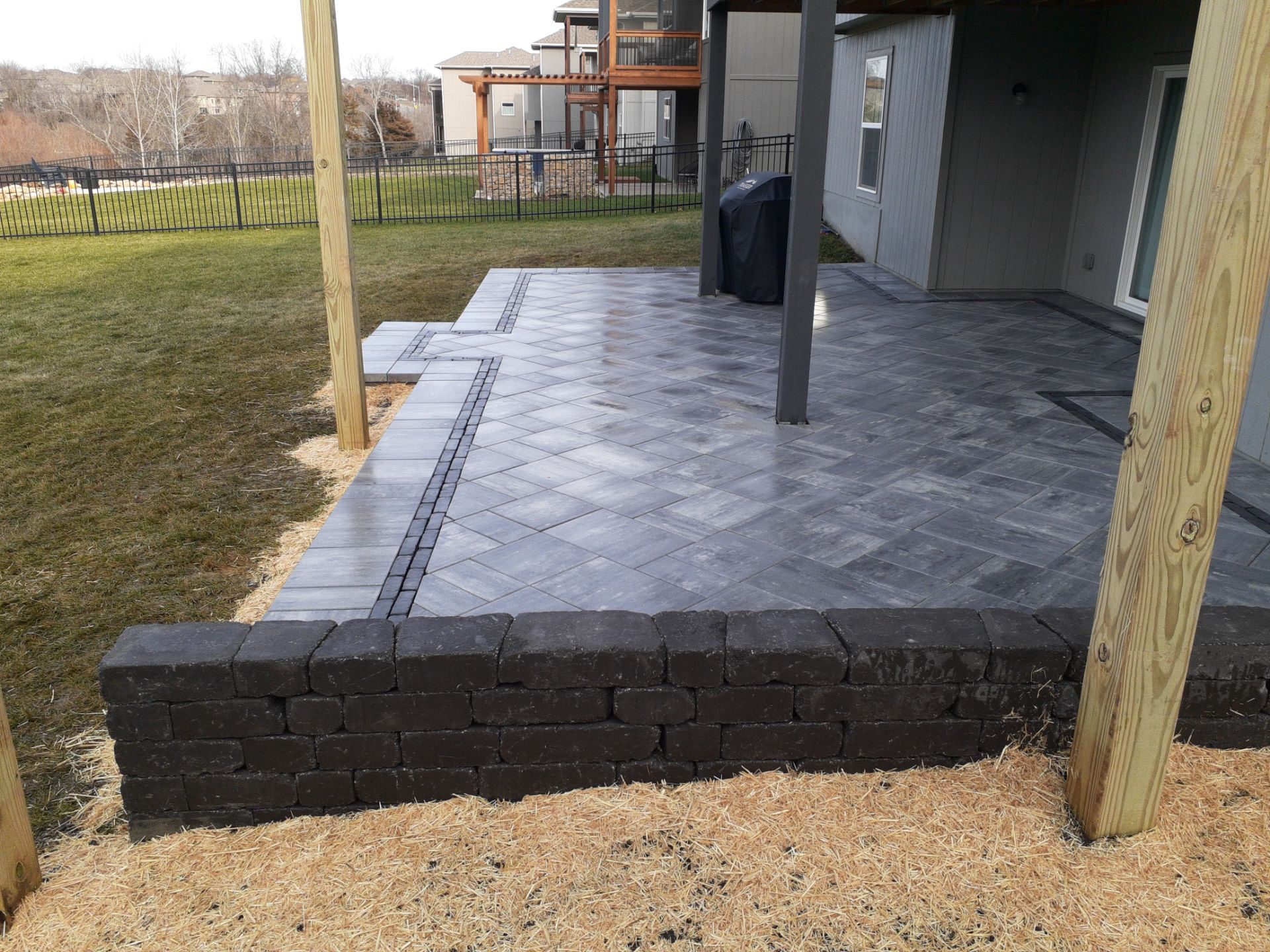 Back Yard Paver Patio by LAND ESCAPES LLC