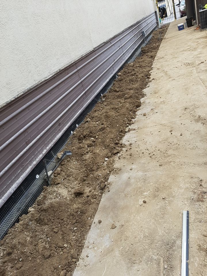 Exterior Deep Waterproofing System with Wall Push Back and Steel Beams Reinforcement by Toledo Basement Repair