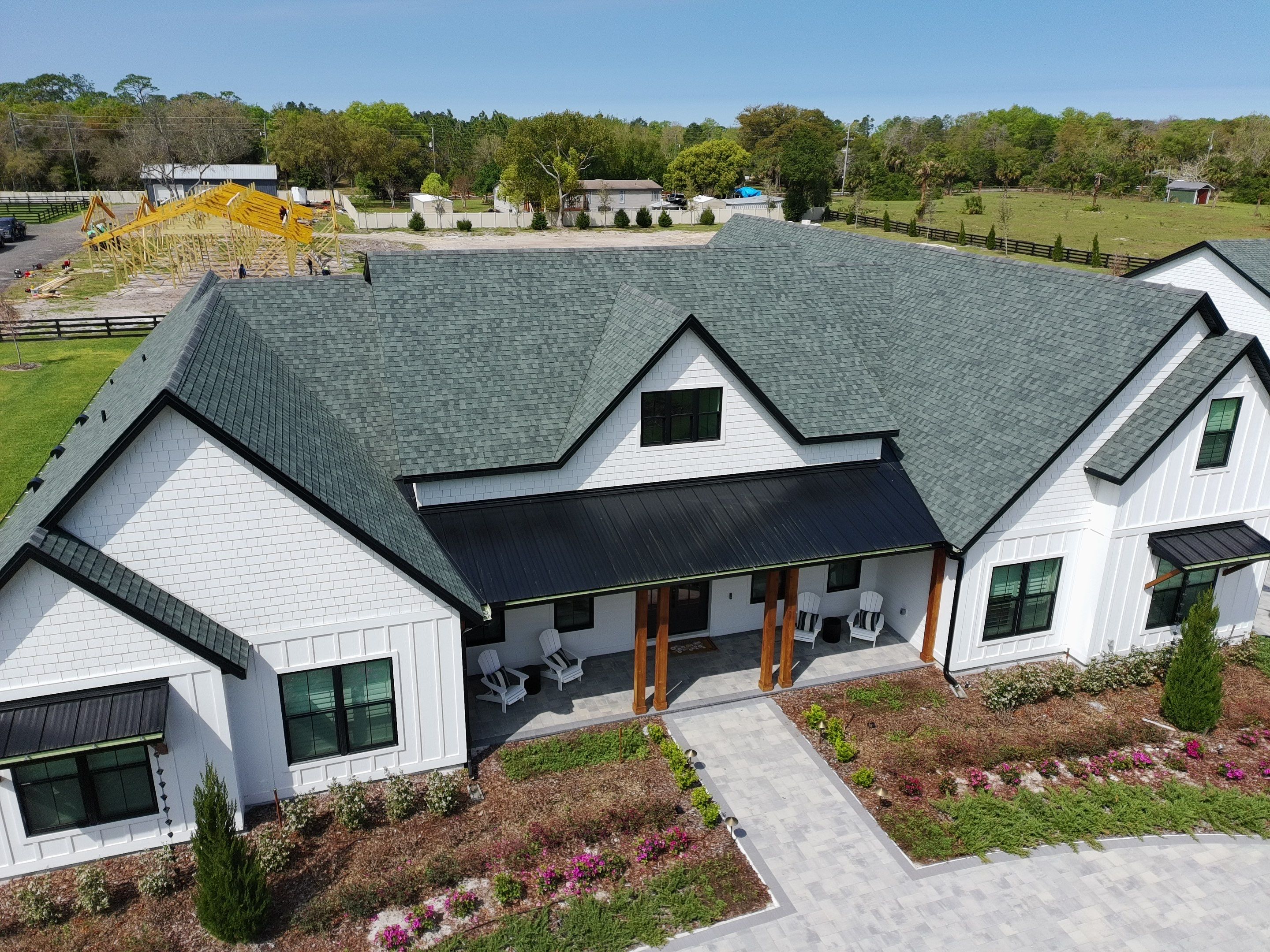 Custom Post-Frame Horse Barn and Shingle Roof Installation in Geneva by Fortified Roofing Solutions Corp.