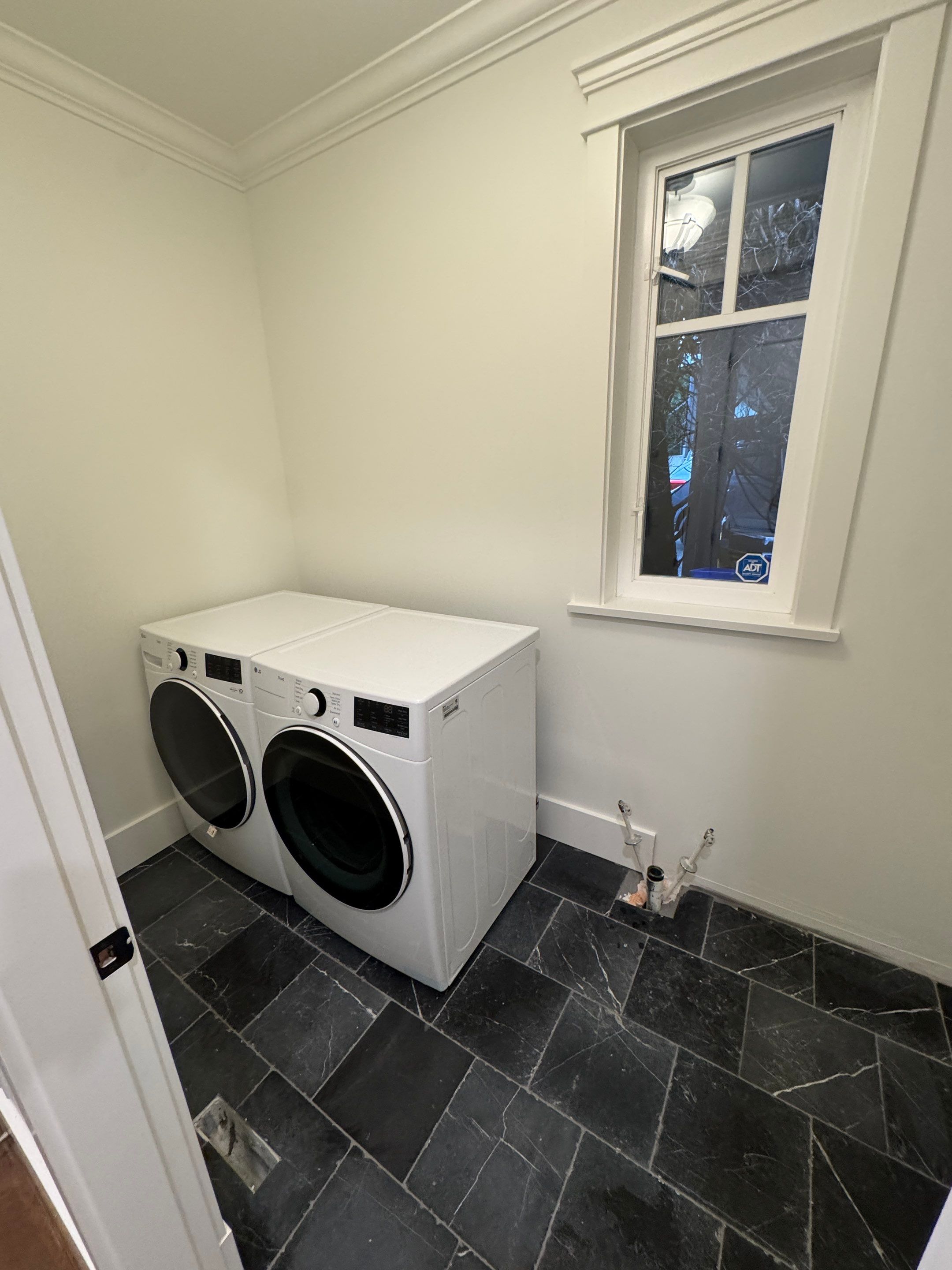 High-End Laundry Room Renovation and Restoration in Vancouver by YVR Construction Group