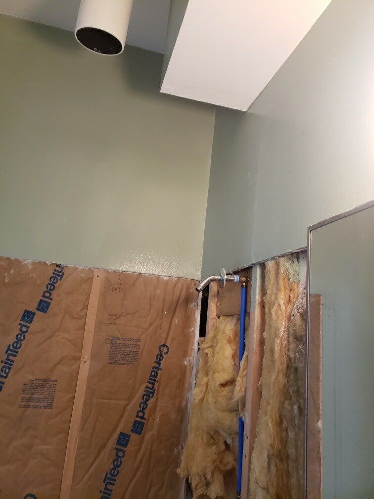 Bathroom Remodel using BCI Acrylic Shower System by Secure Construction Company Inc