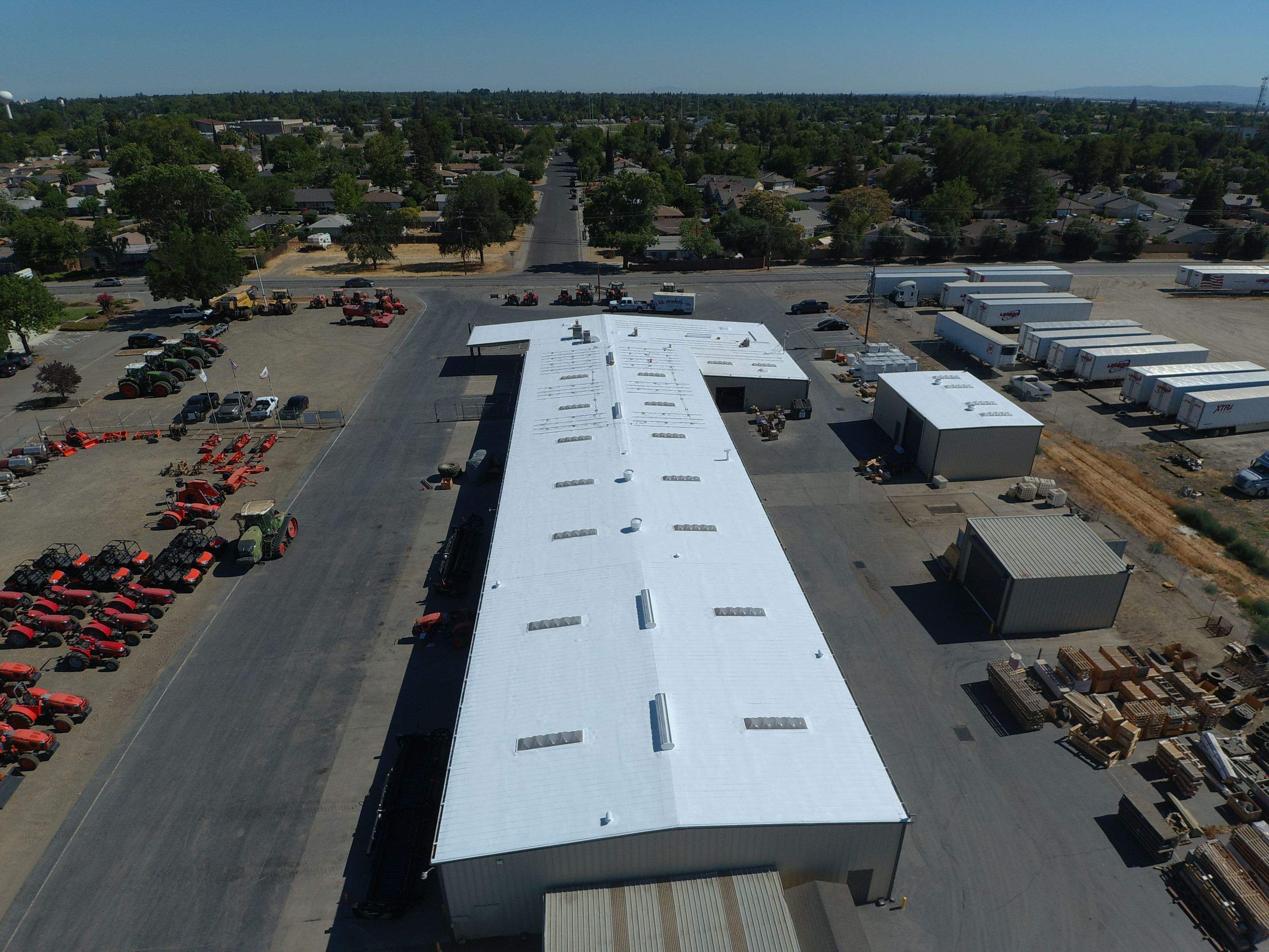 Spray foam and coatings using Conklin Benchmark/PUMA XL coatings and spray foam by Straight Edge Roofing Inc