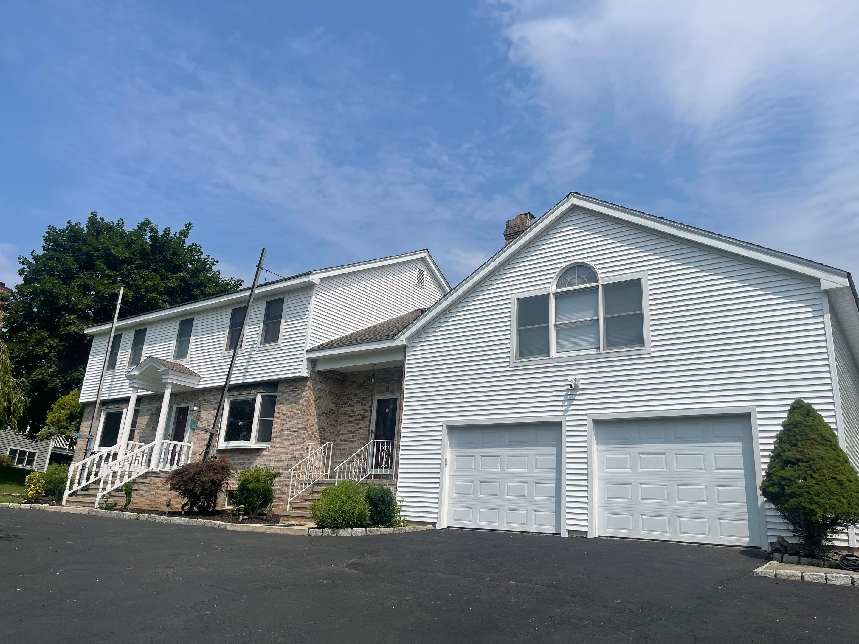Siding Installation using Mainstreet Colonial & White gutters by A Plus Exterior