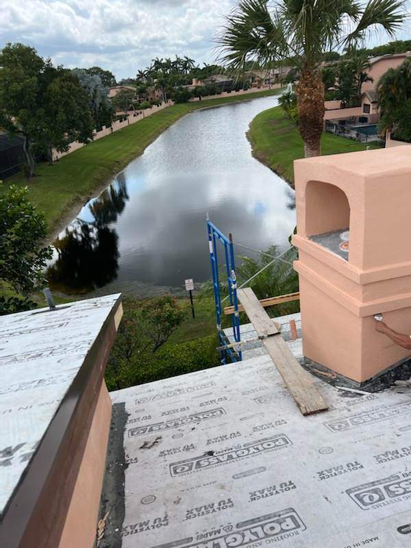 Complete Chimney Rebuild + Tile & Flat Re-Roof  by Morton Roofing, Inc.