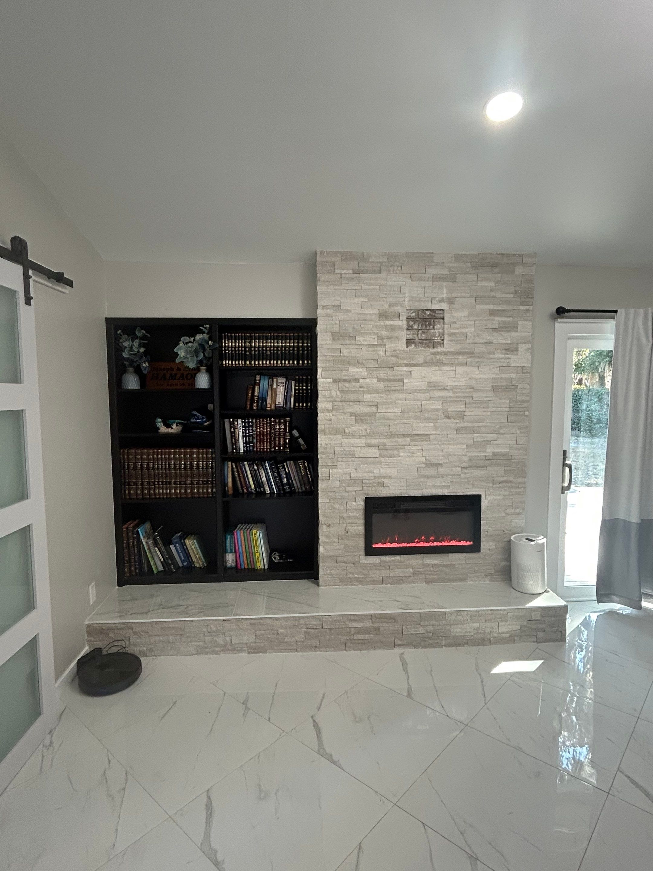 Master Bathroom, Children's Bathroom, and Fireplace Renovation by urban green energy llc