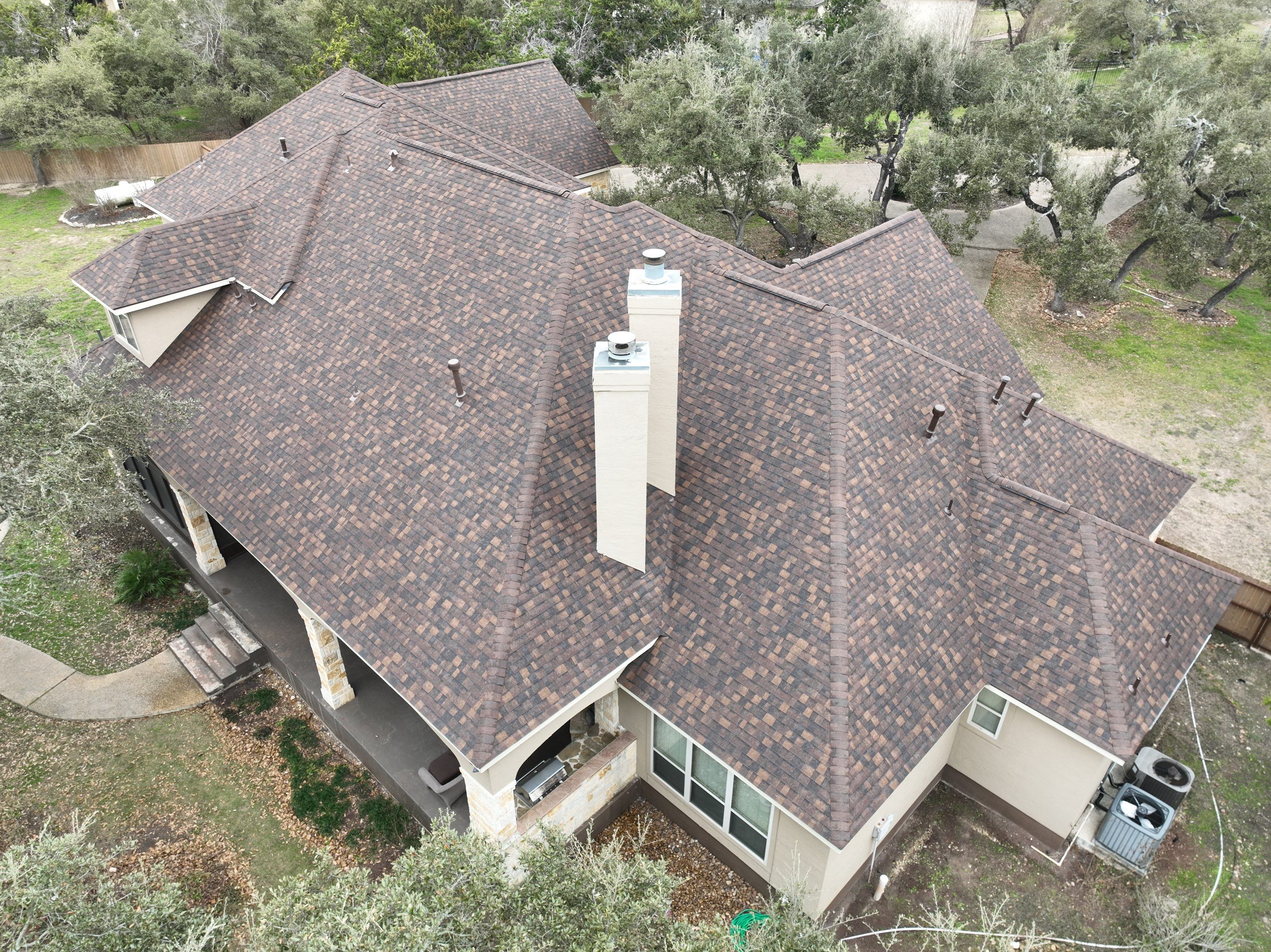 Residential Roof Replacement using 30 Year Laminate Shingles with High Profile Ridge by Premier Roofing and Contracting