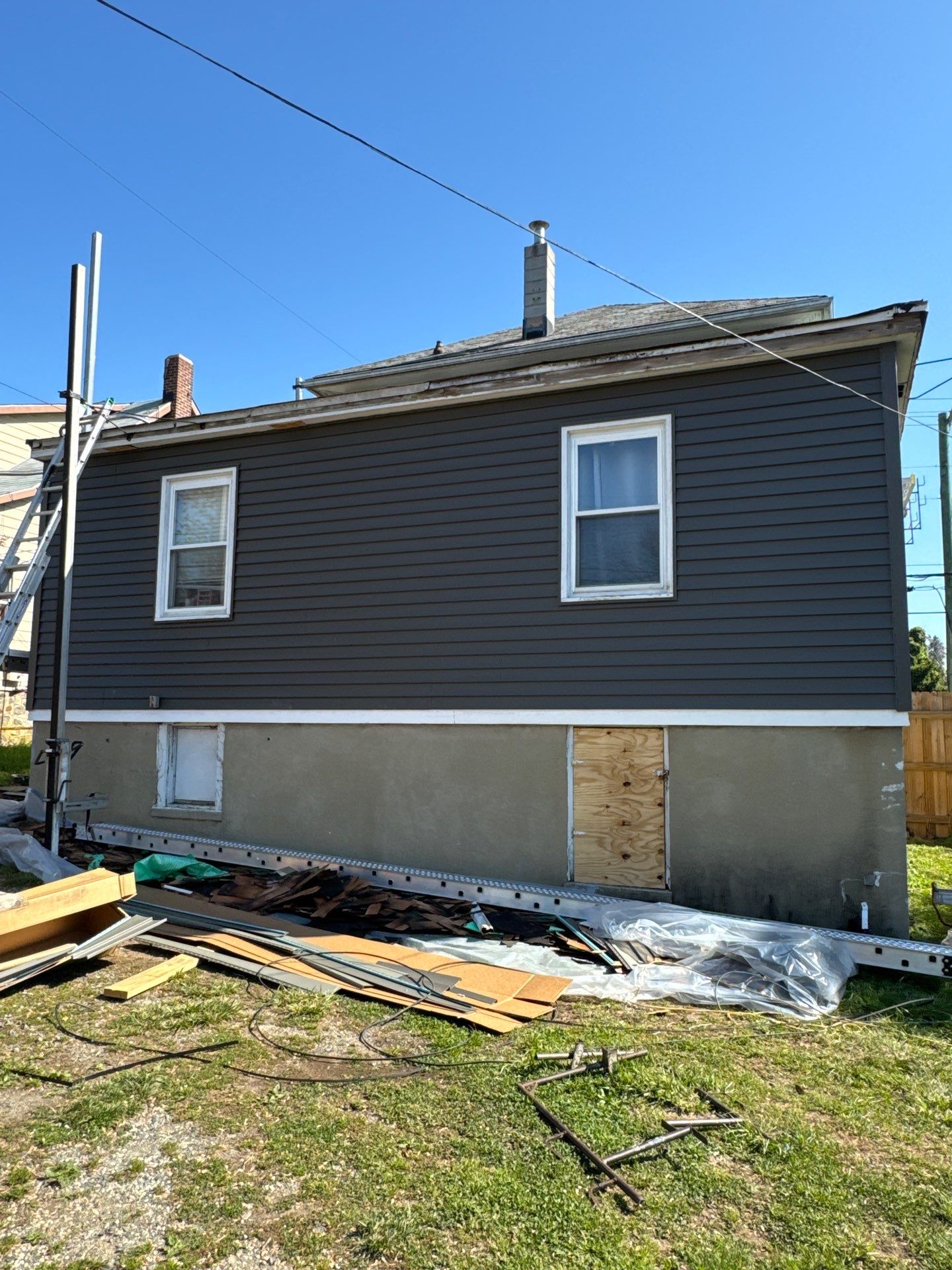New siding & New Gutters by Alpha Design Services