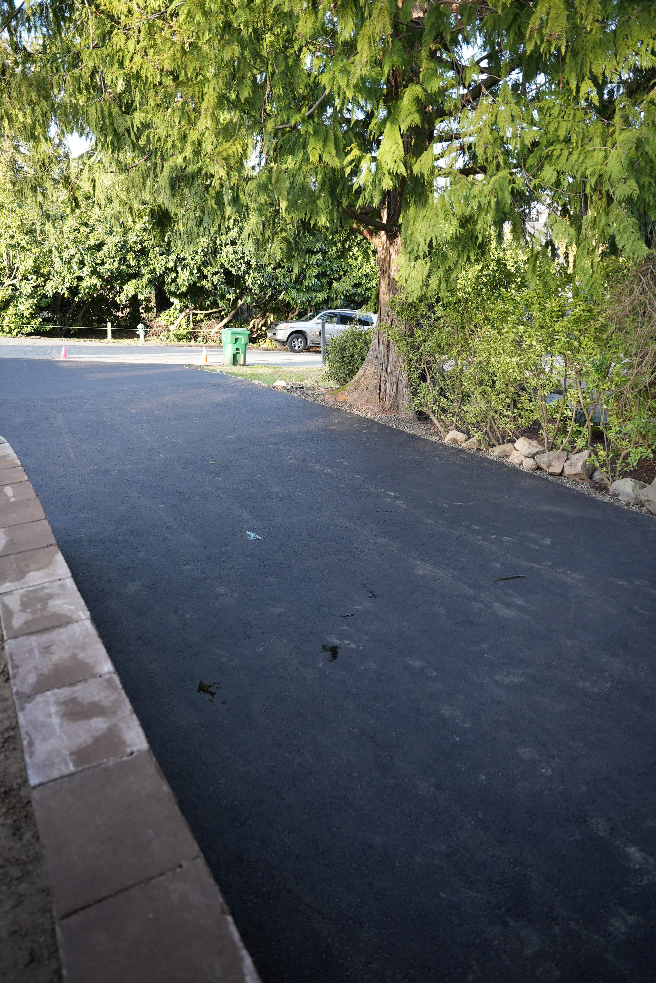 Lorra | Asphalt Driveway Repair & Retaining Wall by Jireh Asphalt & Concrete Inc 
