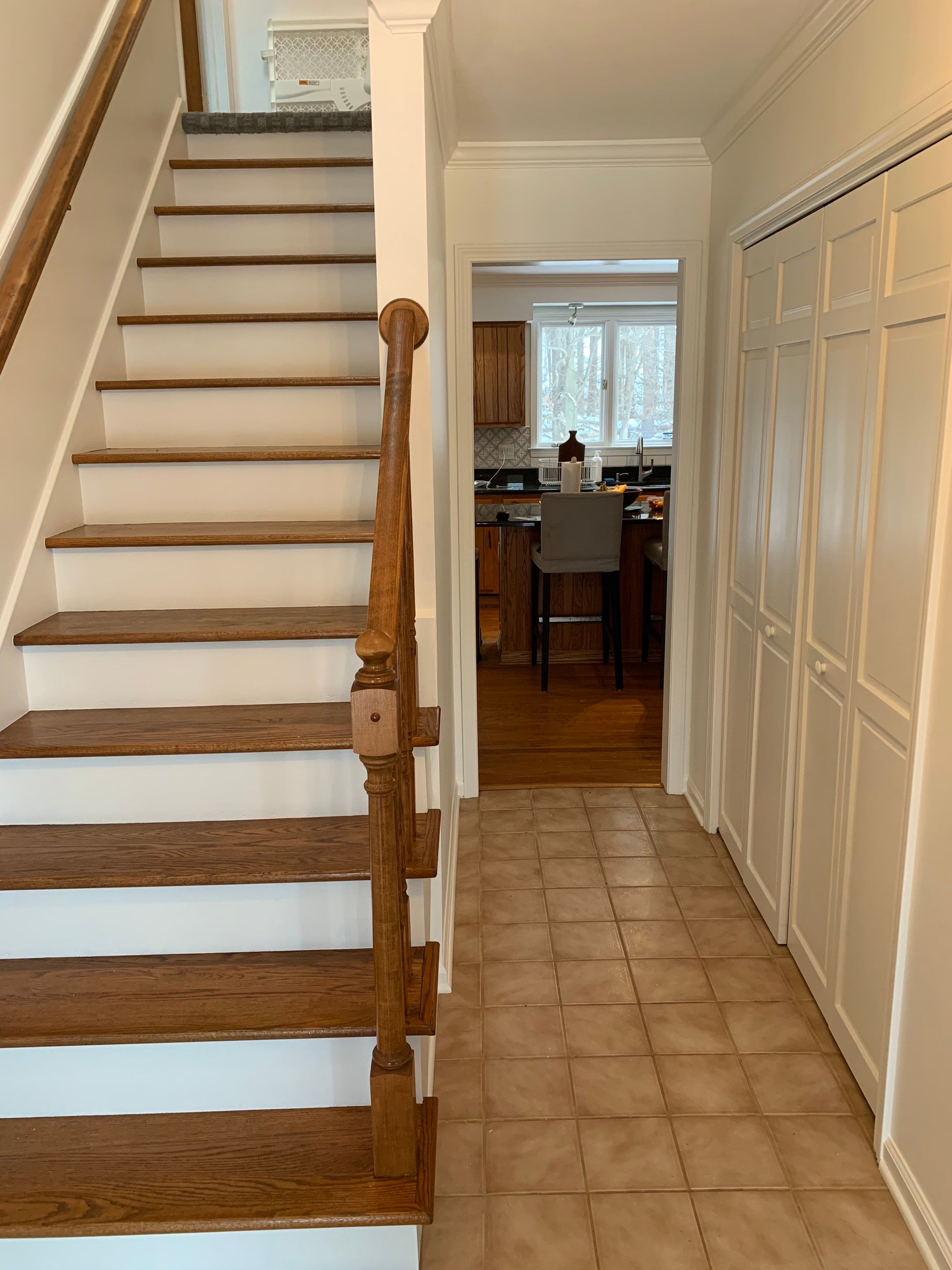 Painting Stained Wood Trim and Staircase. Walls too! by Empire Painting Services, LLC