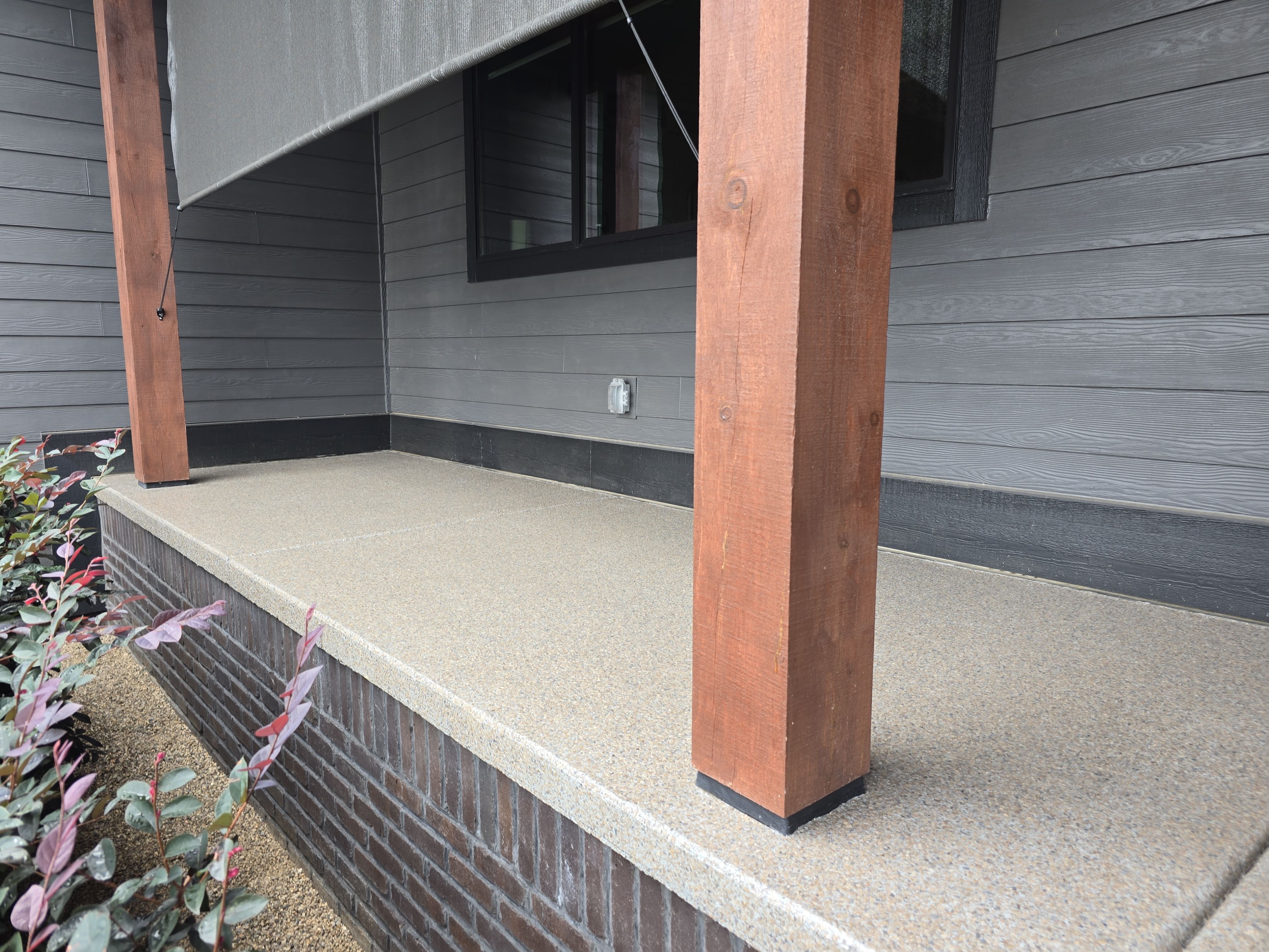 Front Porch and Garage using Obsidian by Elite Floor Solutions