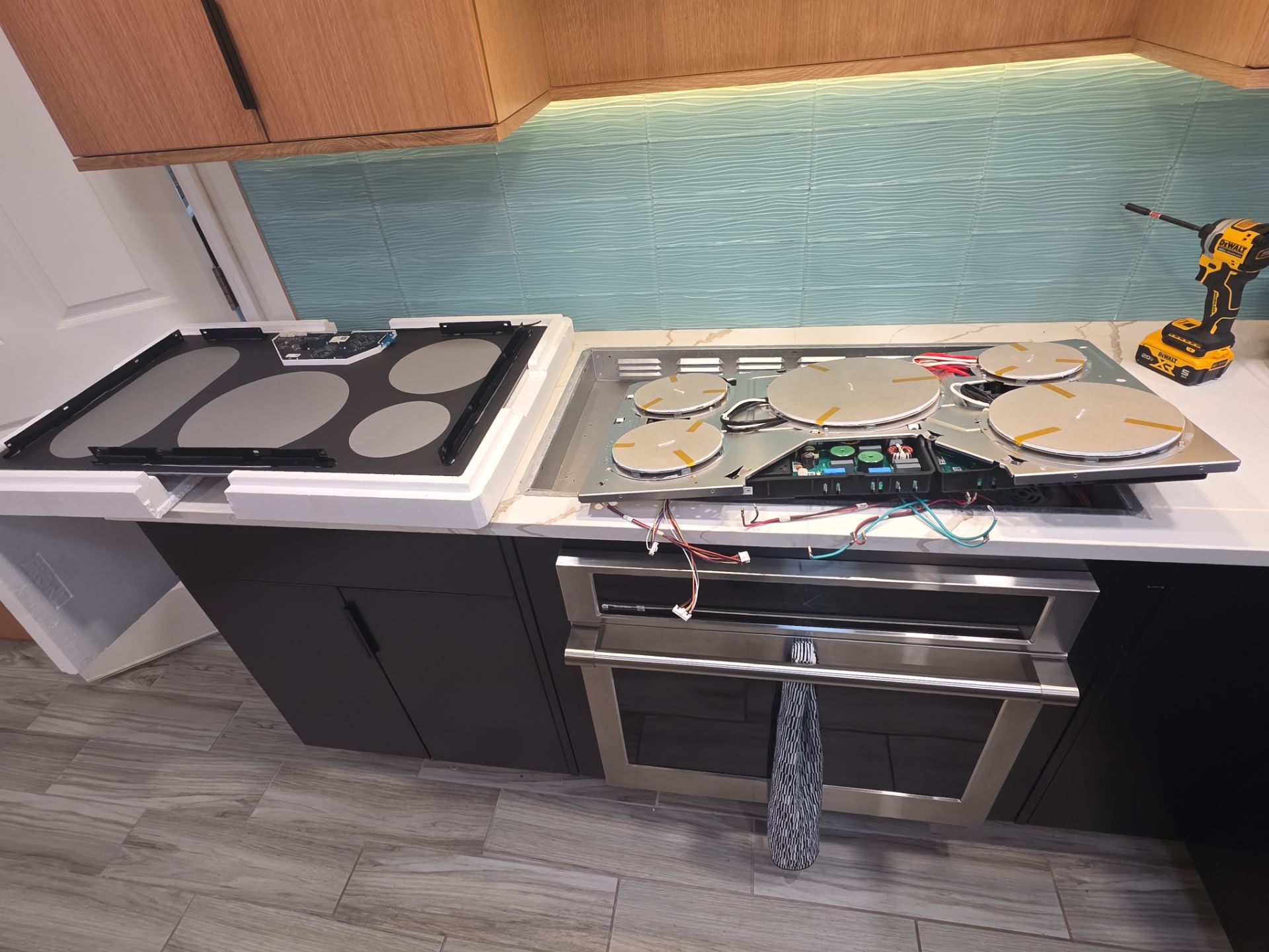 GE Monogram Induction Cooktop and Wall Oven Installation in The Villages by AMB-WORKS APPLIANCE REPAIR