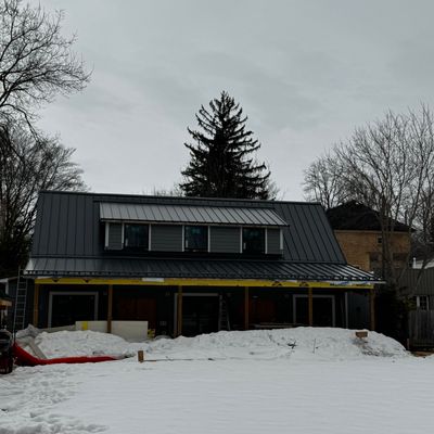 Commercial Roofing Installation using 16" Standing Seam Panels