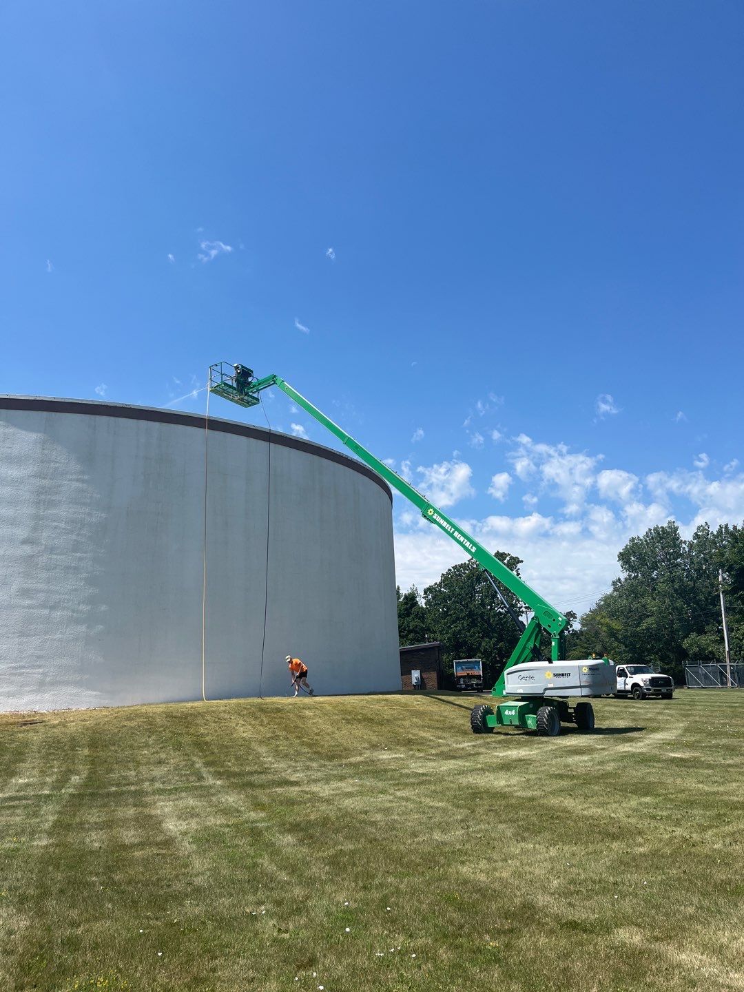 Water tank cleaning by Northern Power Washing LLC.