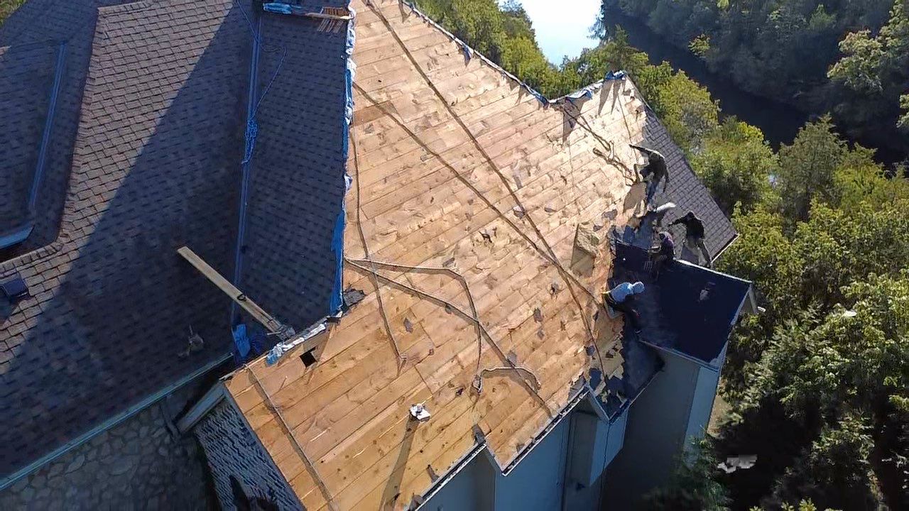 Residential Roofing + Gutters & Downspouts & Gutter Guards Install  by Titan Commercial & Residential Roofing 