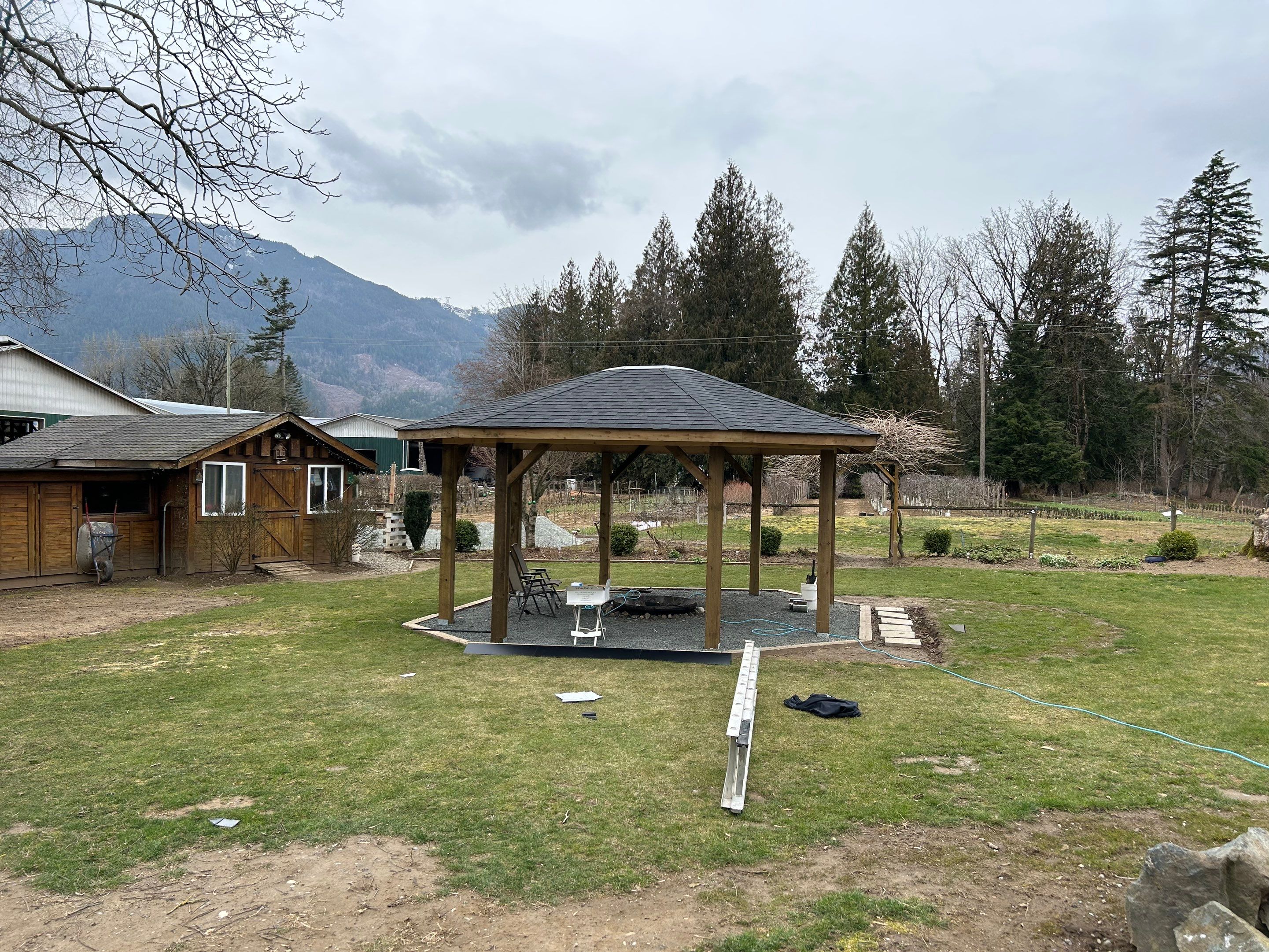 Residential Roofing Installation using OC Oakridge shingles for Gazebo by Top Notch Roofing Inc