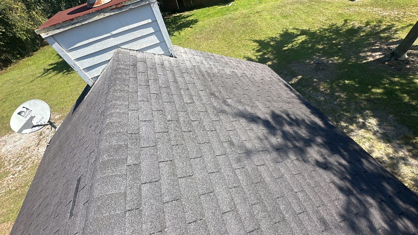 Residential Roofing Installation using Benton 26Ga 1inc Snapcock Metal Roof KYNAR Matte Black by Talya Roofing