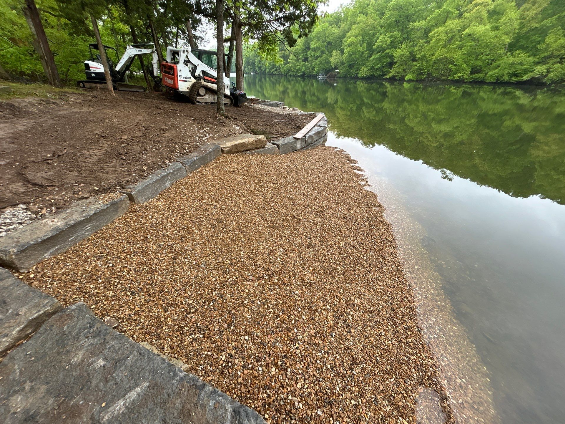 Lakeside Deck & Fire Pit by Loch Ness Landscaping, LLC