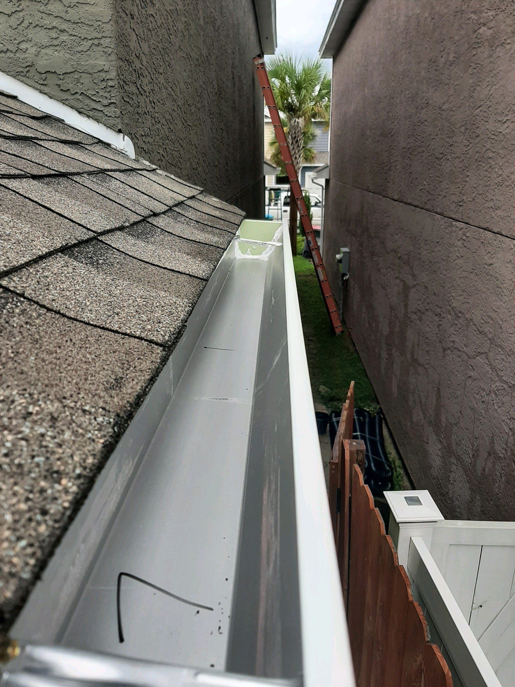Seamless Gutter Installation using White K-Style Gutters by Gutter Professors