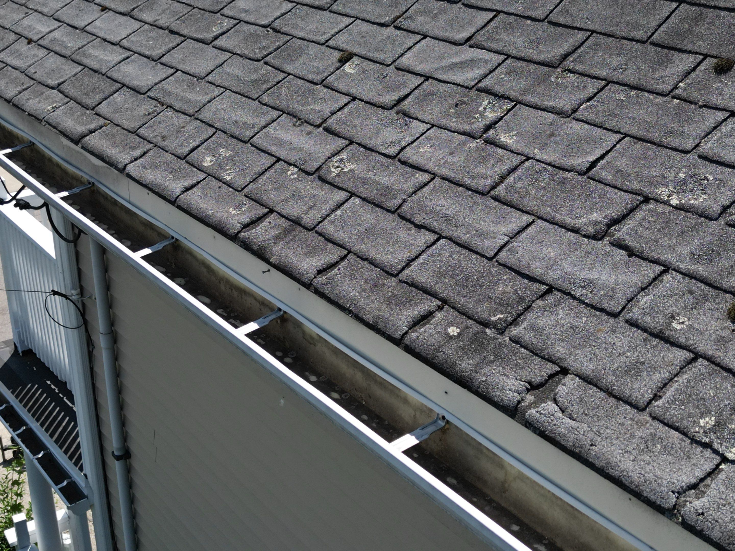 Roof Replacement with Skylight Flashing in Waltham, MA by Mighty Dog Roofing of Greater Middlesex County