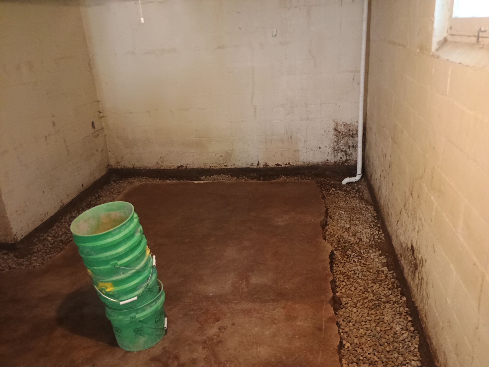 Interior Drain Tile & Sump Pump System in North Minneapolis by Waterproofing Northeast