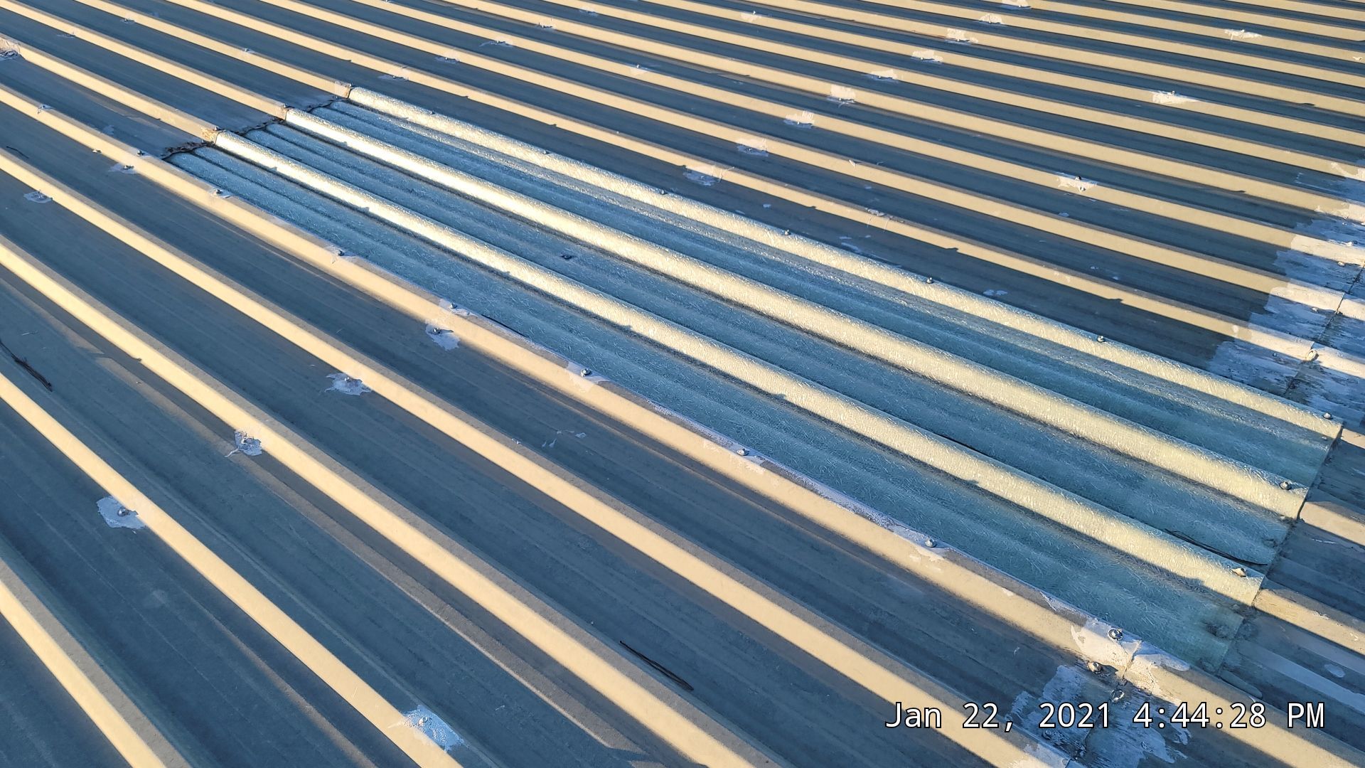 Commercial Roofing Installation using Aldocoat Coatings by Hostetler Roofing