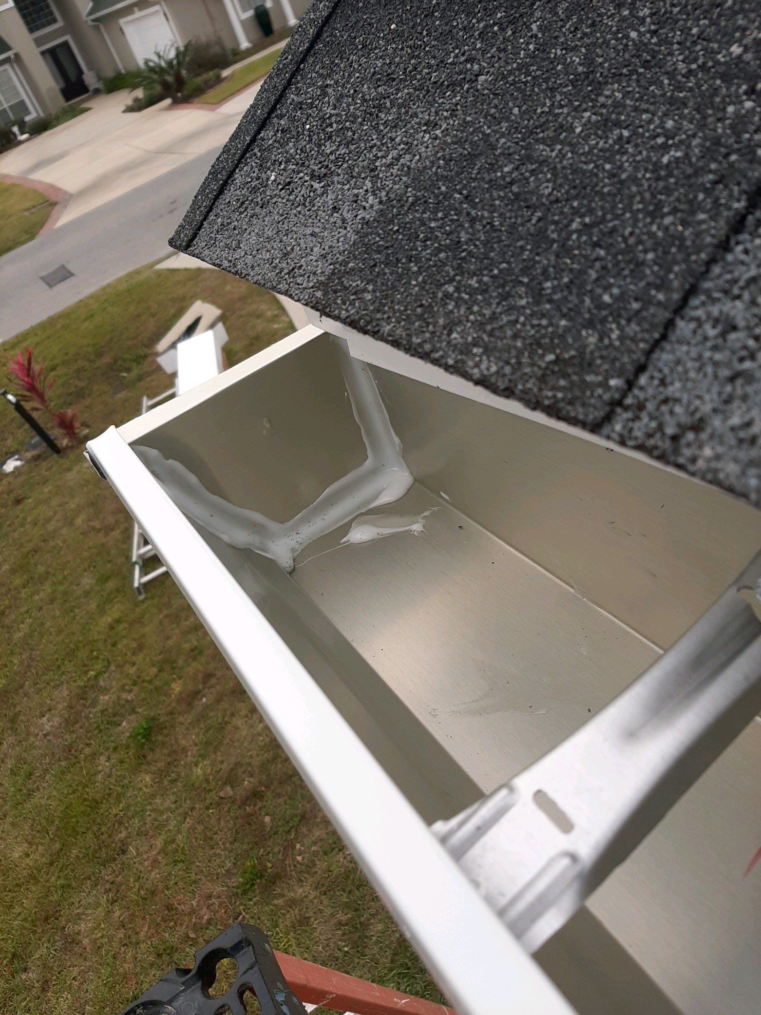Gutter Installation using White K-Style Seamless Gutters by Gutter Professors