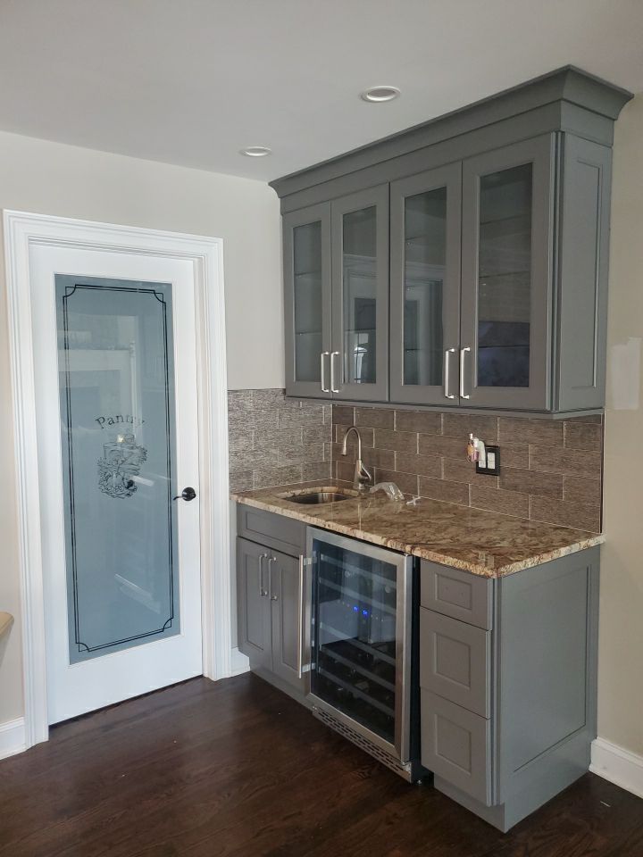 Kitchen Cabinets Refinished in Kendall Charcoal HC-166  by Spectrum Painting, LLC