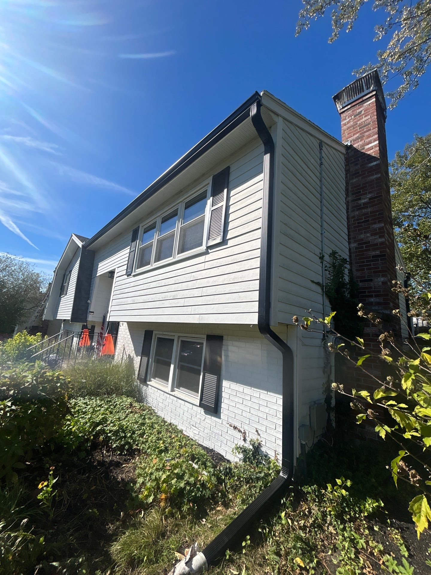 Seamless Black Gutter & Fascia Upgrade | Methuen, MA by Mighty Dog Roofing of Greater Middlesex County