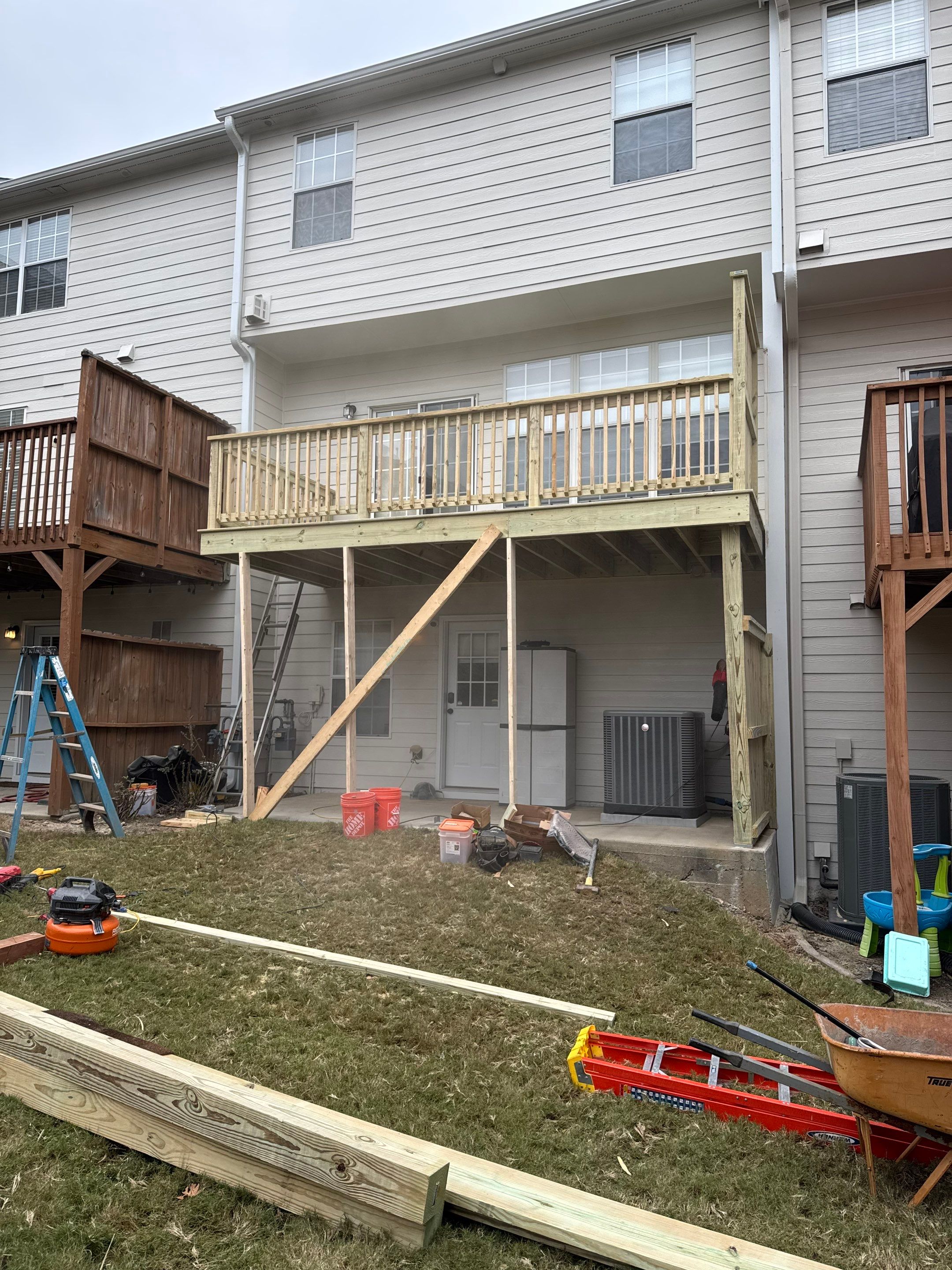 New Second-Story Pressure-Treated Wood Deck Installation in Atlanta by Swift Home Renovations
