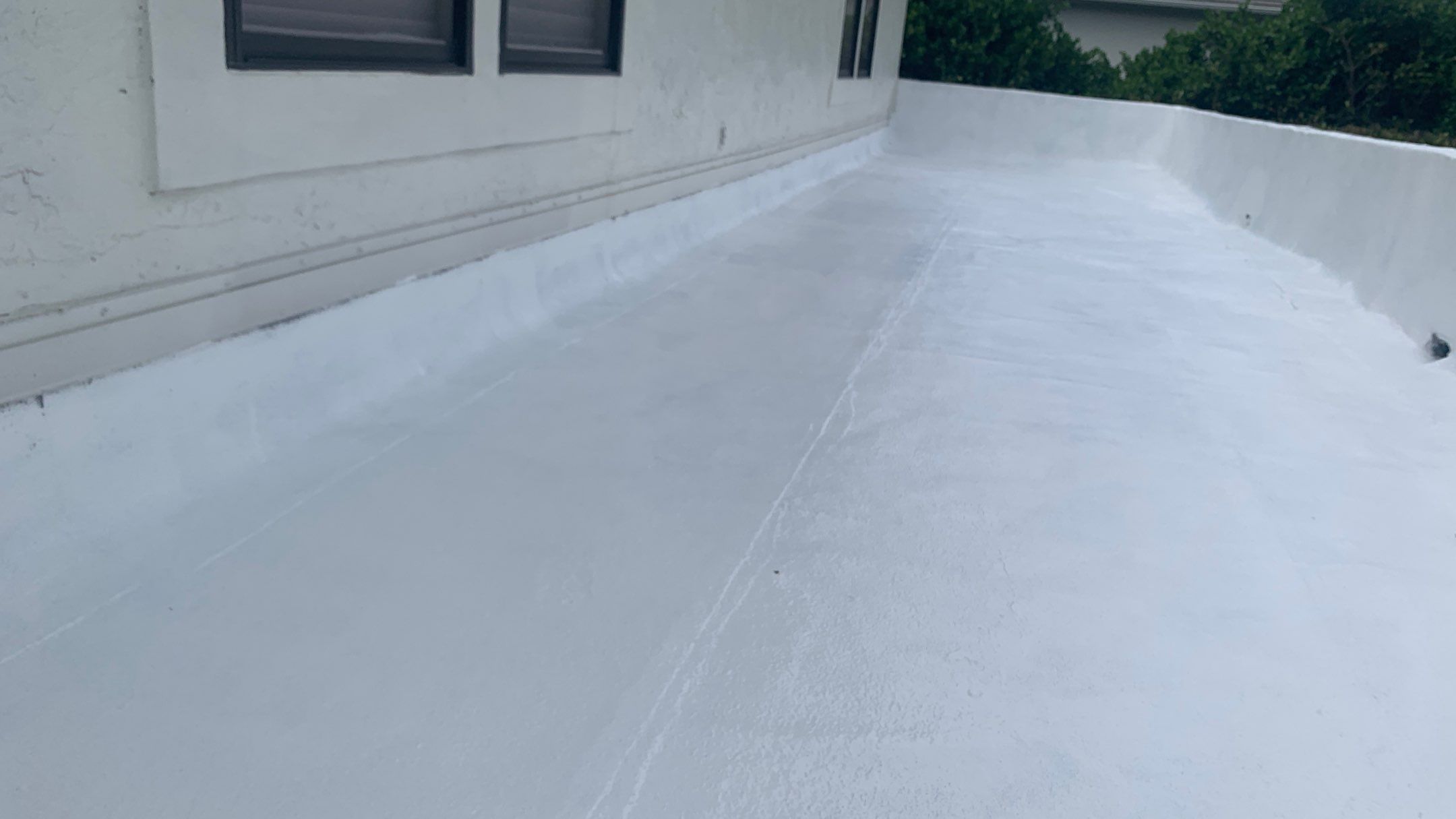 Residential Roofing Installation using Polybrite 90.1 silicone coating by BLUES BROTHERS CONSTRUCTION CORP