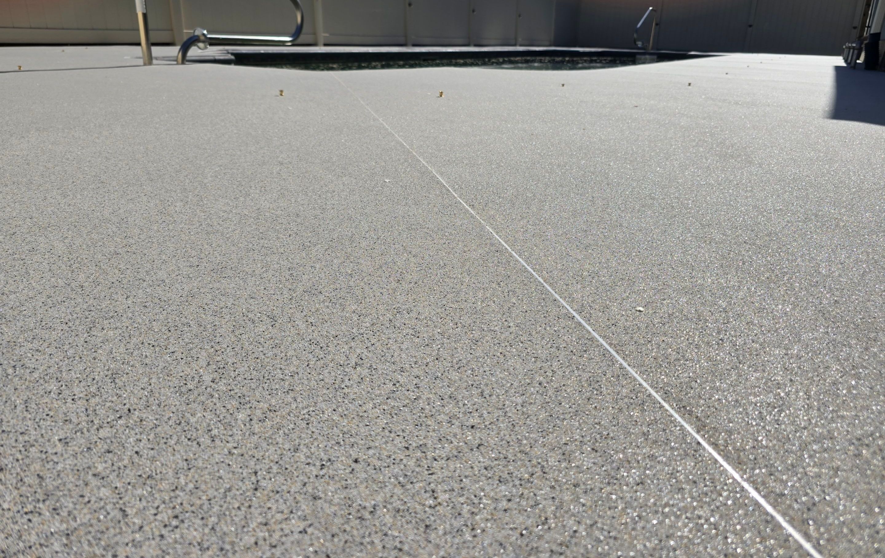Pool Deck Upgrade Using Quicksand by Elite Floor Solutions