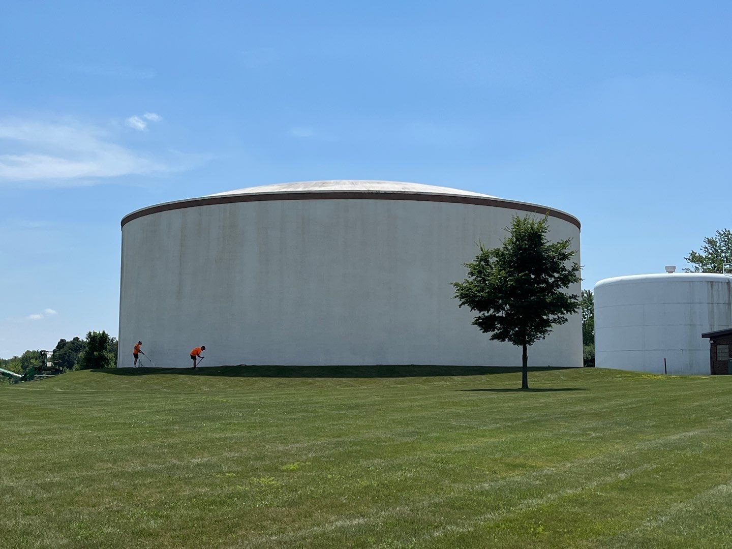 Water tank cleaning by Northern Power Washing LLC.