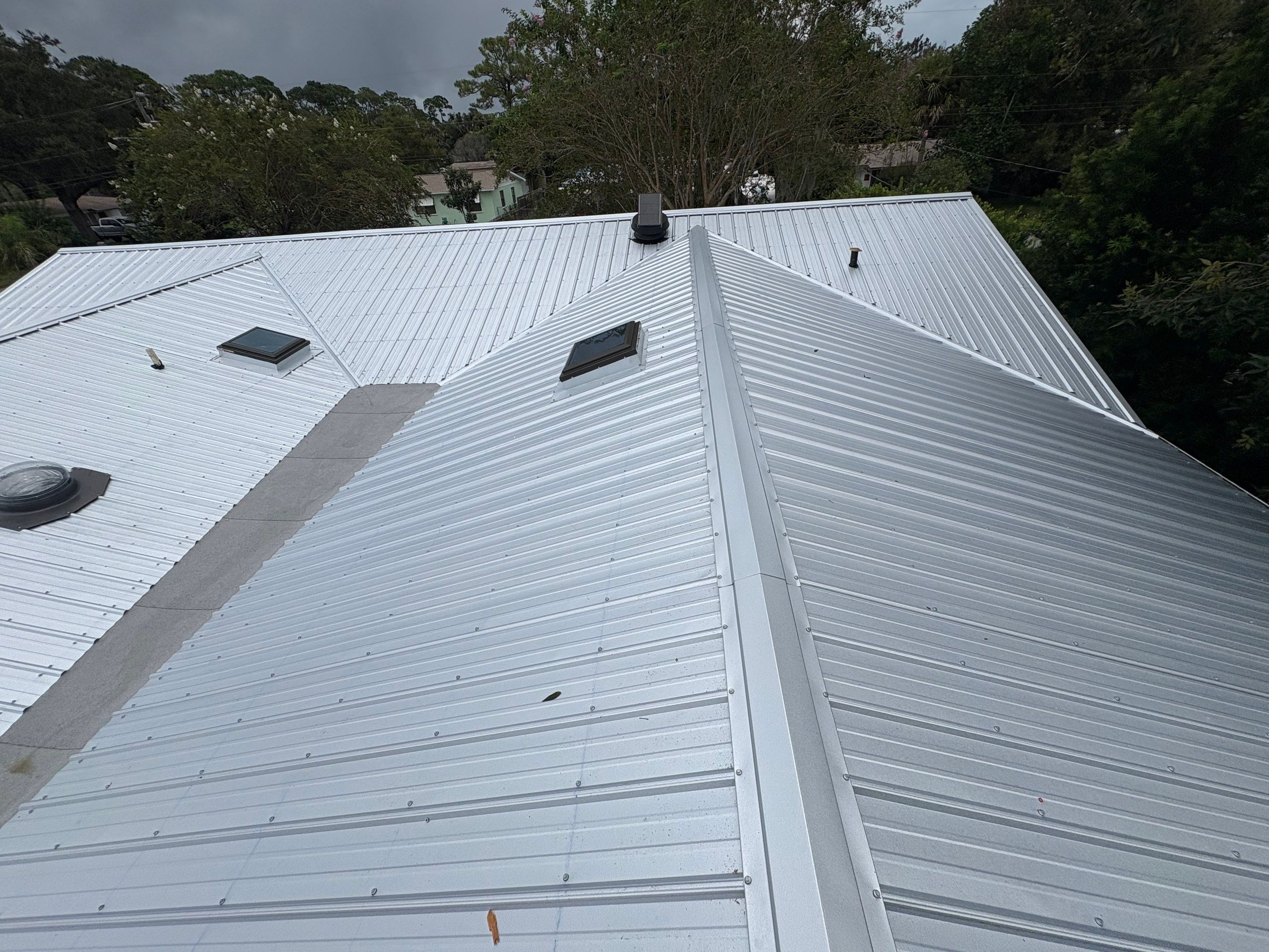 Residential Metal Roofing Installation with Ultra Rib Panels in New Smyrna Beach by Pinnacle Roofing Group