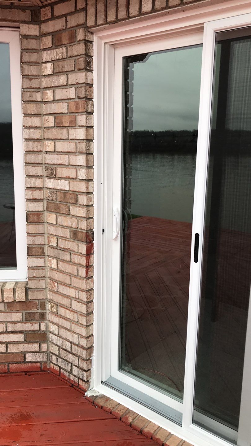 Deck Refurbush and Door Replacement using Trex Decking and Railing.  Polaris Patio Doors by Secure Construction Company Inc