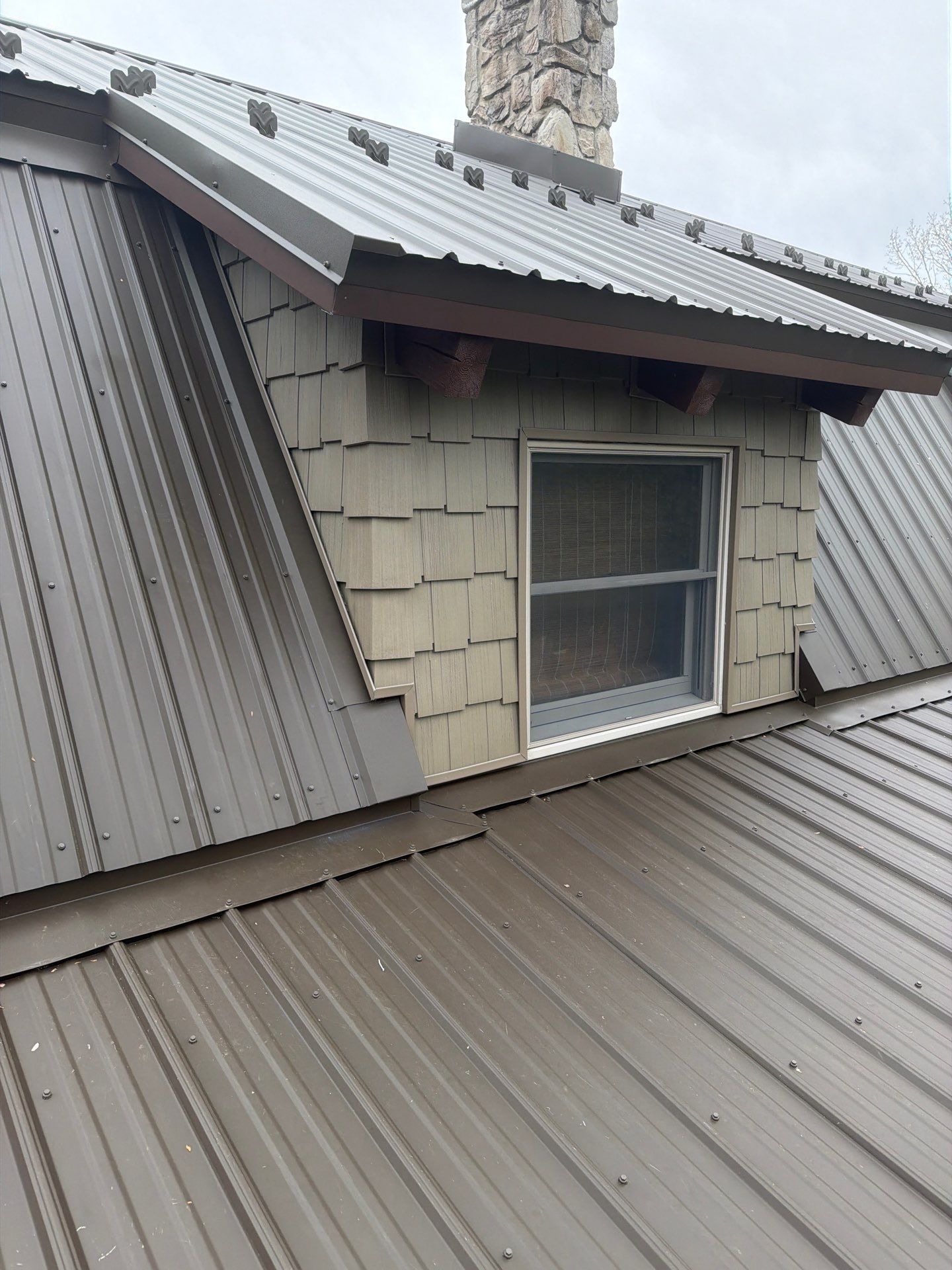 Textured Bronze ABM Metal Roof and Skylight Installation in Halifax by Esh Builders