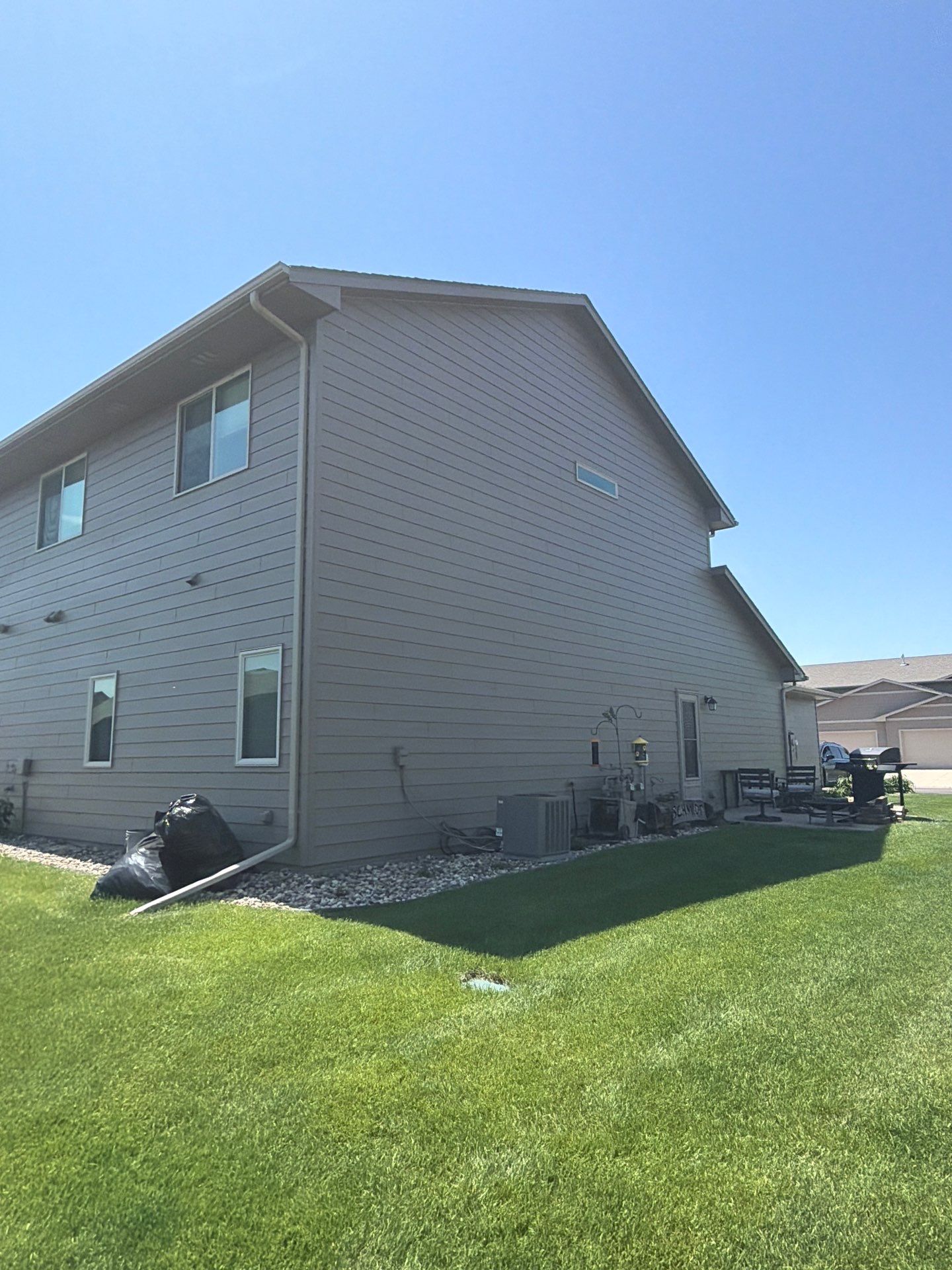 Multi-Family Exterior Painting and Trim Refresh in Sioux Falls by Select Painting, Coatings & Garage Cabinets