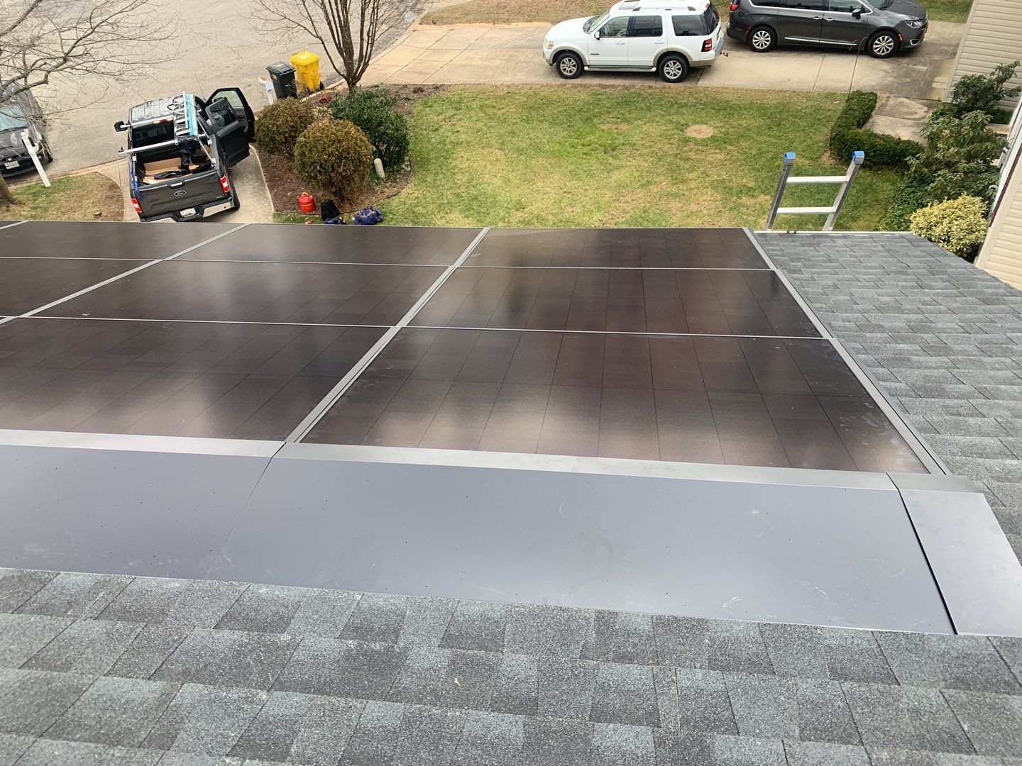 Roof Replacement with GAF Decotech integrated solar panels by American Home Contractors