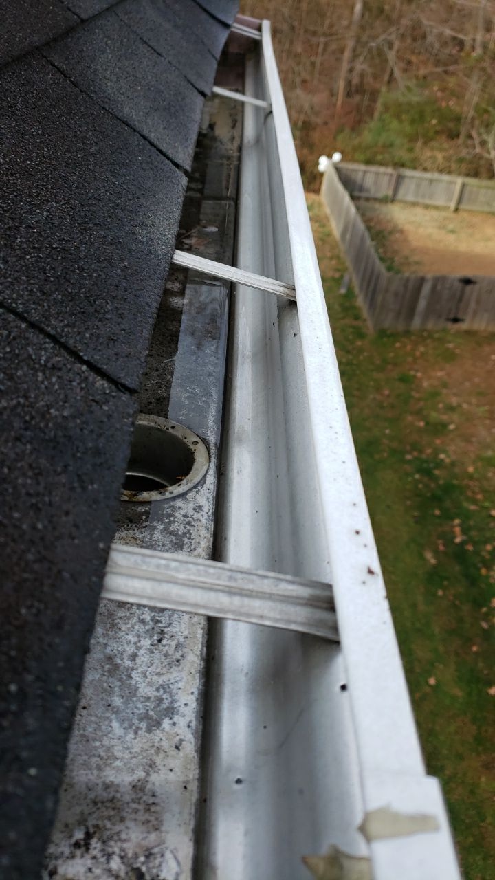 gutters and Driveway by Power Wash Masters LLC