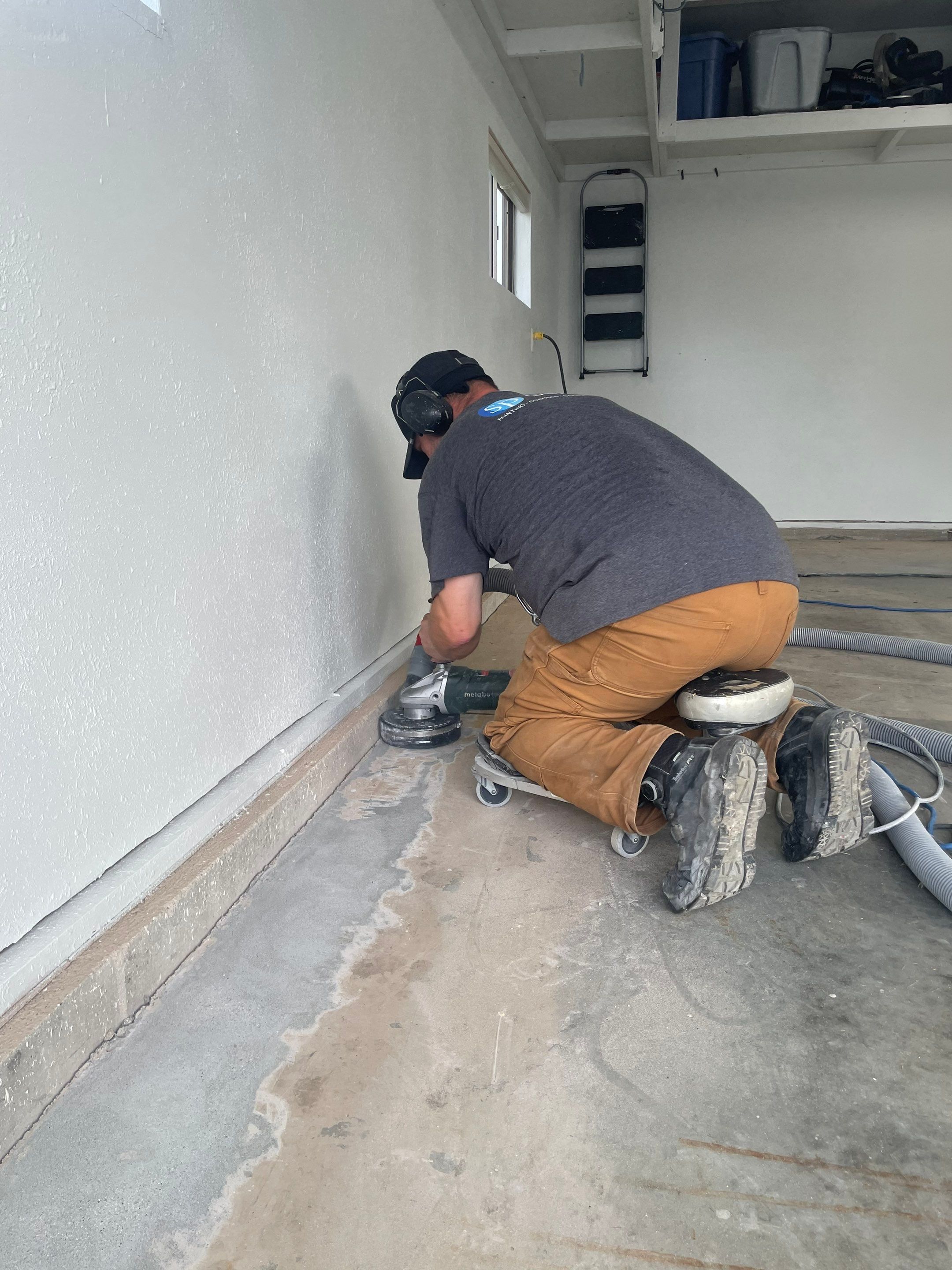 Multi-Car Garage Floor Coating and Crack Repair in Tea by Select Painting, Coatings & Garage Cabinets