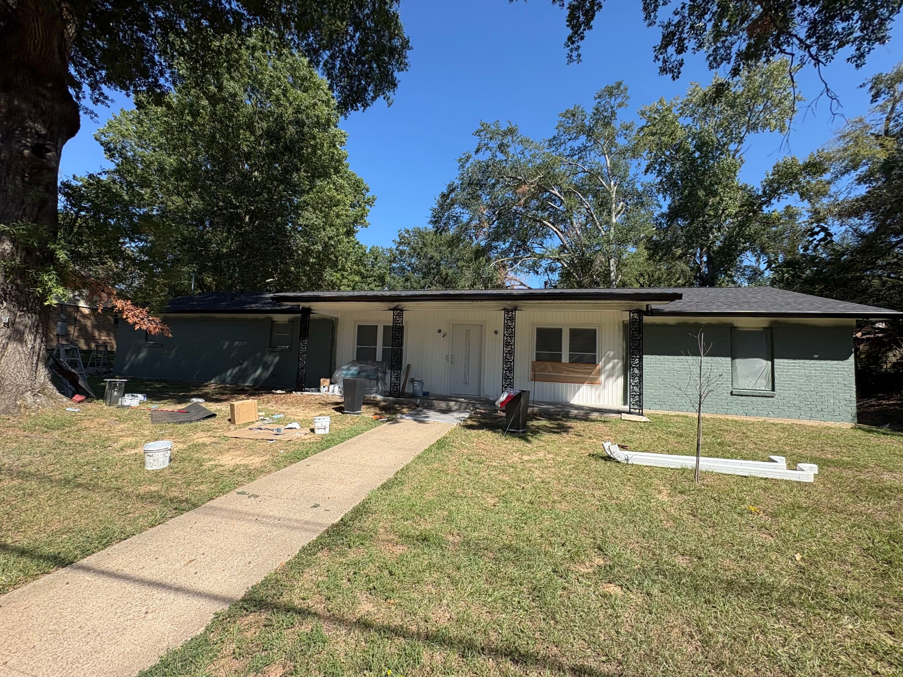 From Basic Brick to Bold Sage Green in Tyler, TX! Quality Coats Painting by Quality Coats Painting