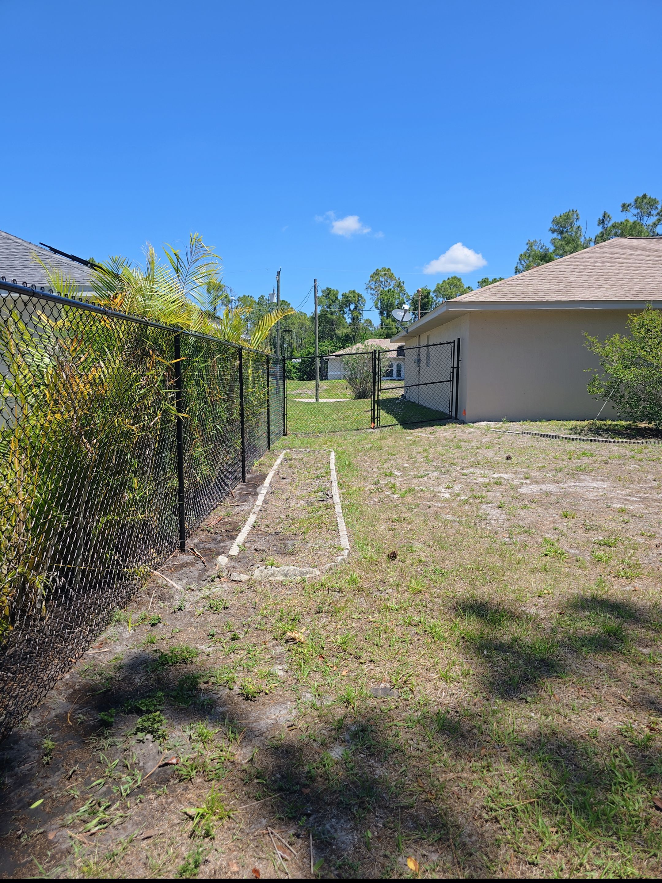 Black Chain Link Fence in North Port by True Fence LLC