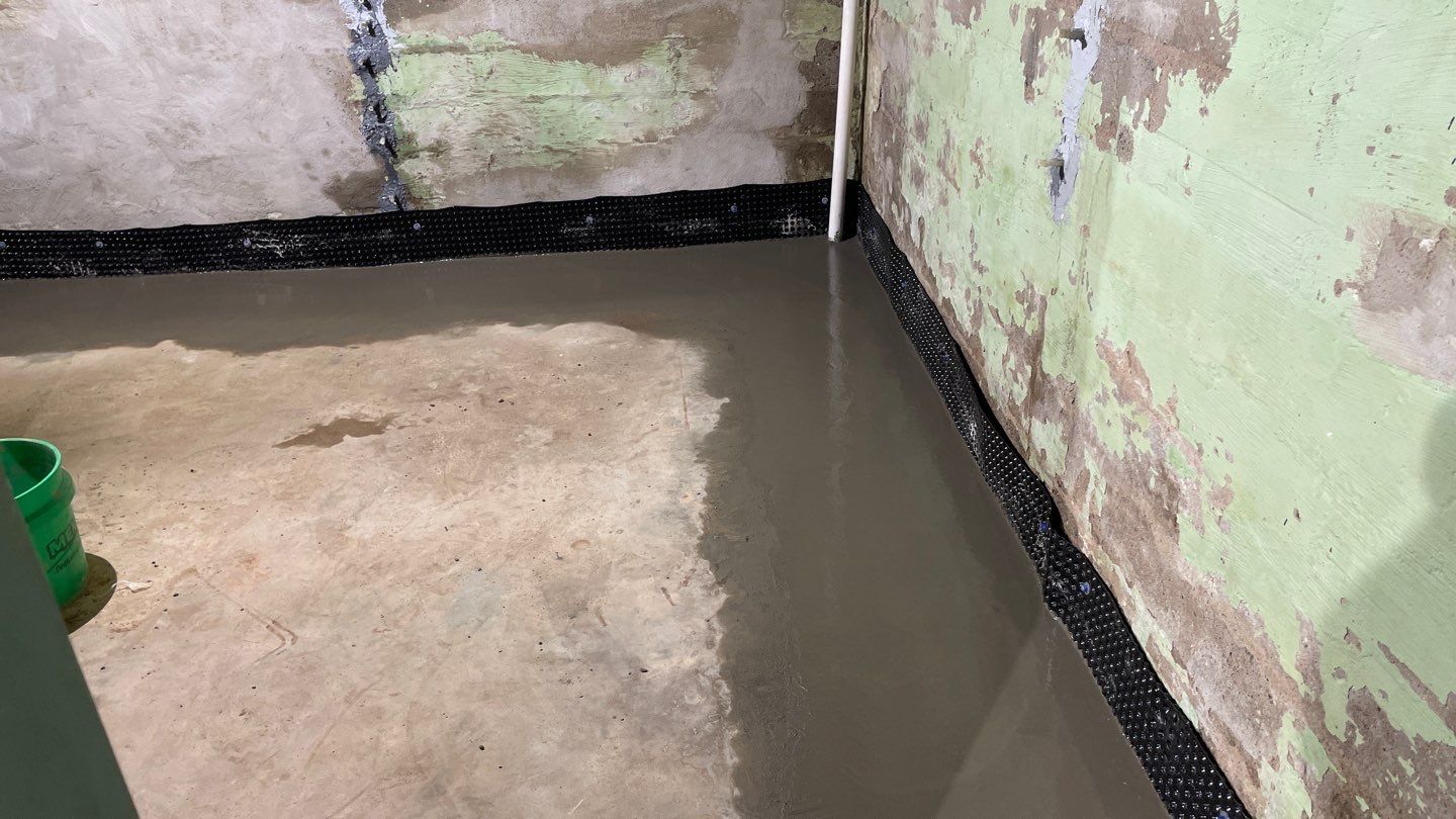 Interior Drain Tile & Foundation Crack Repair in Northeast Minneapolis by Waterproofing Northeast