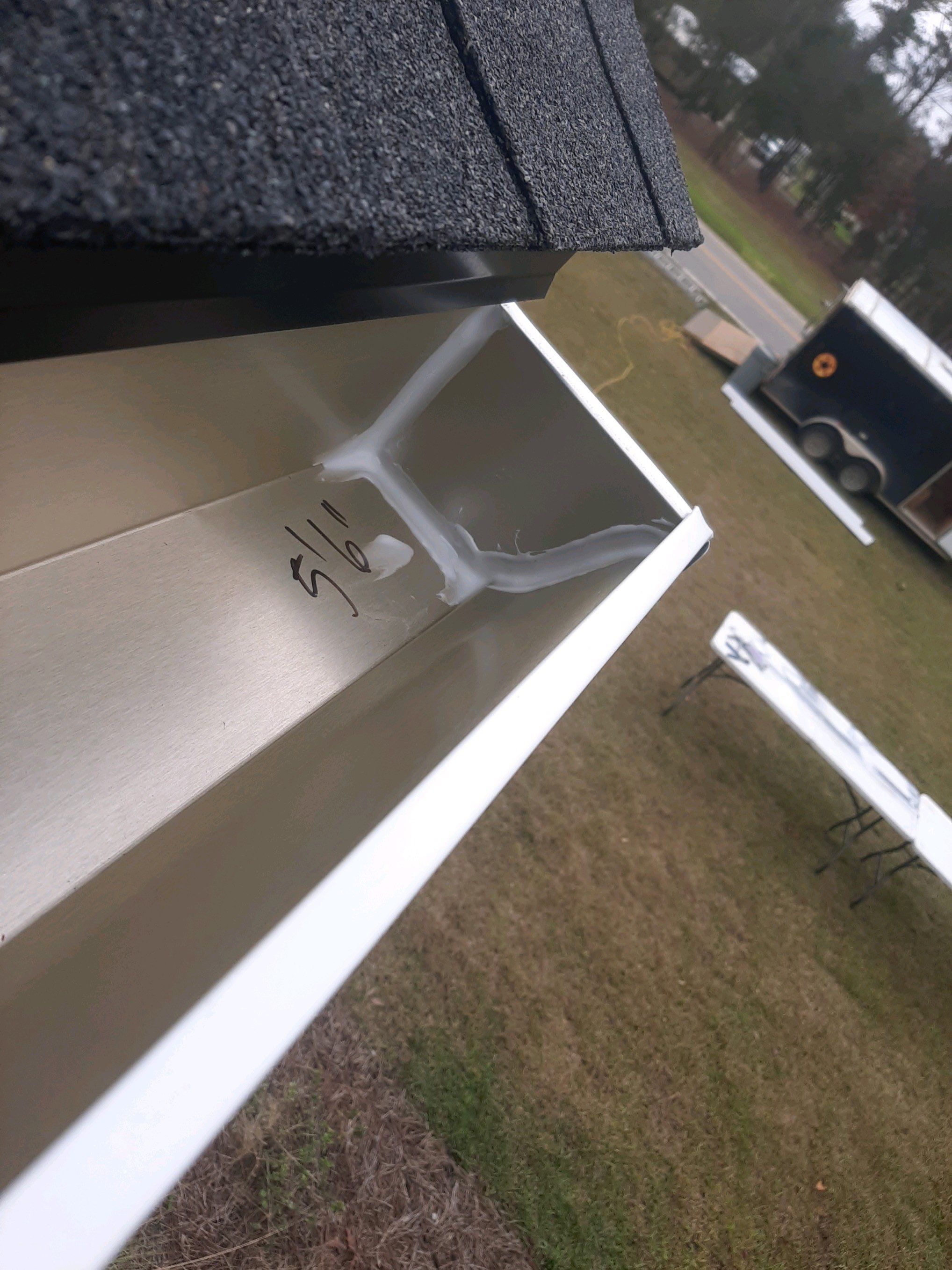 Seamless Gutter Installation Using White K-Style Gutters by Gutter Professors