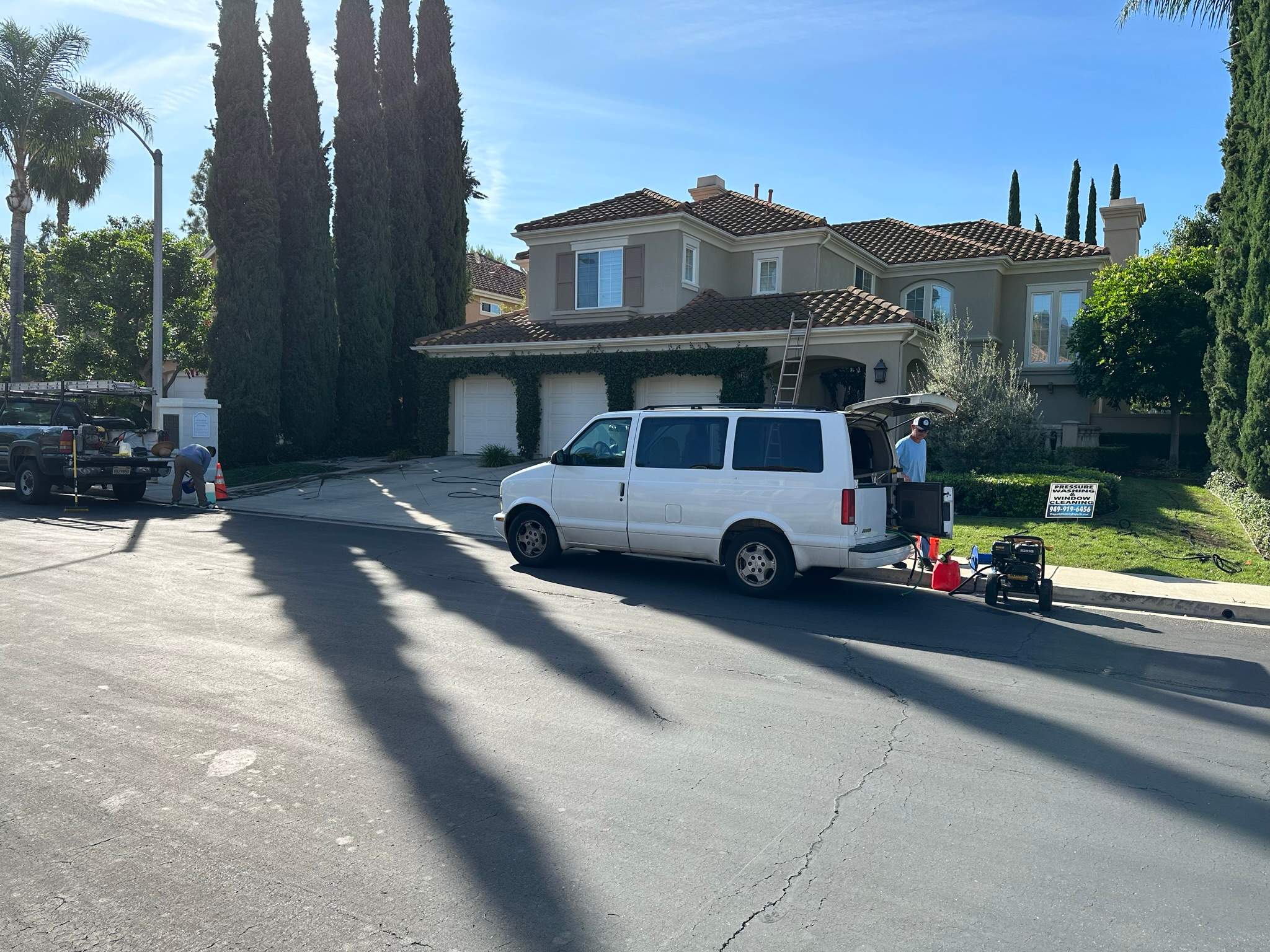 Roof wash on this dirty roof covered in algae by Property Cleaning Experts, LLC
