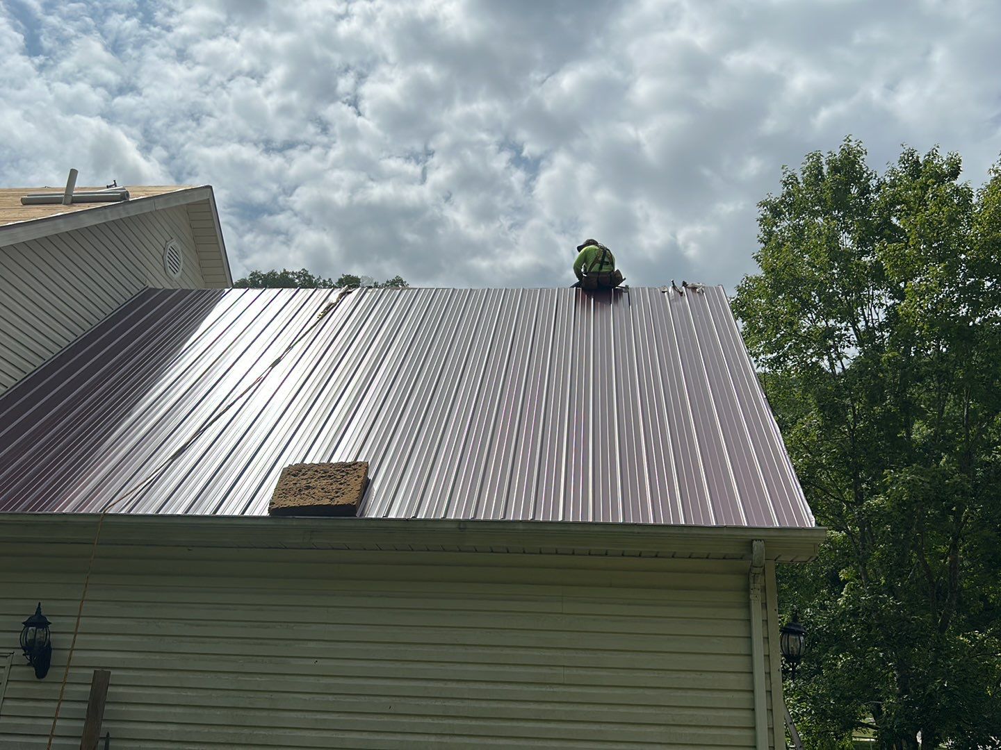 Residential Roofing Installation using Metal by Mr. Roofer