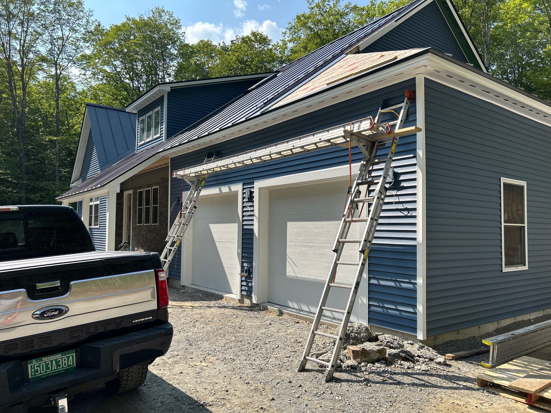 Installation of a Clopay Modern Steel Garage doors by Keene Door