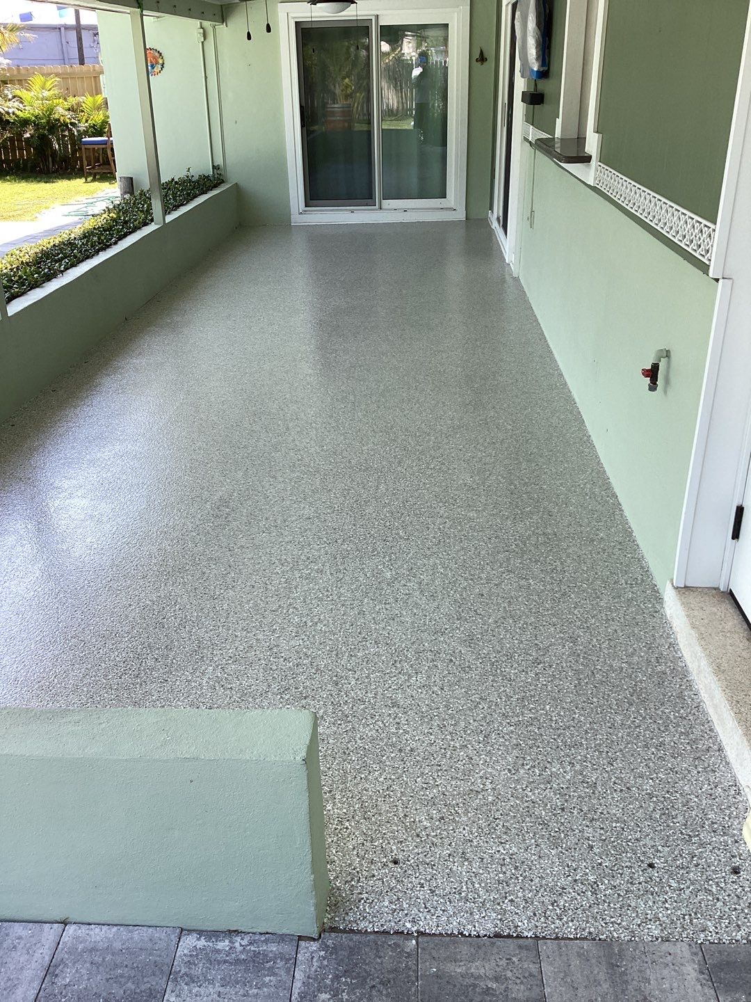 Patio using Mt Everest by Amvet concrete coatings llc