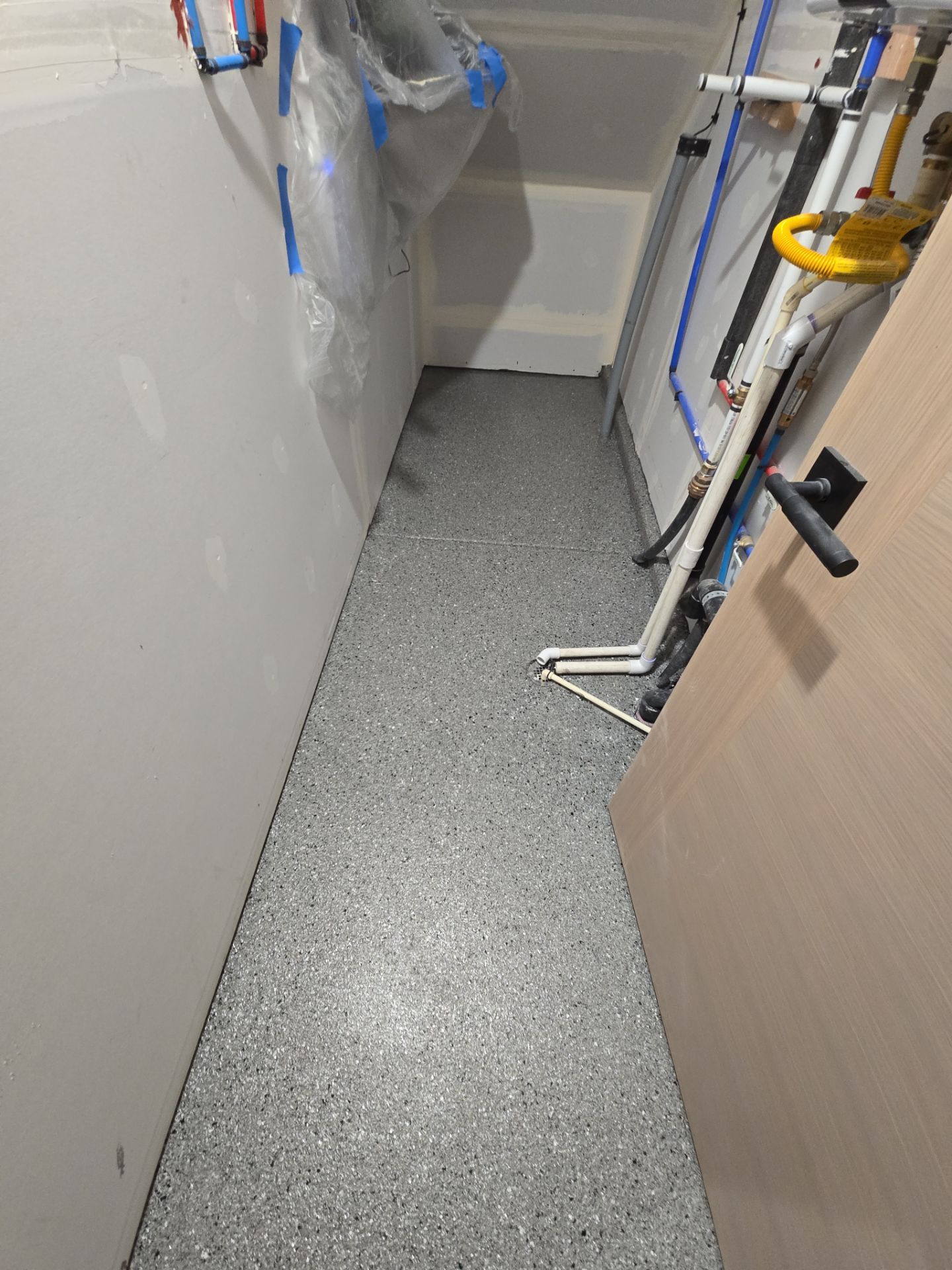 Garage Transformation using Slate Hybrid by Croc Coatings, LLC