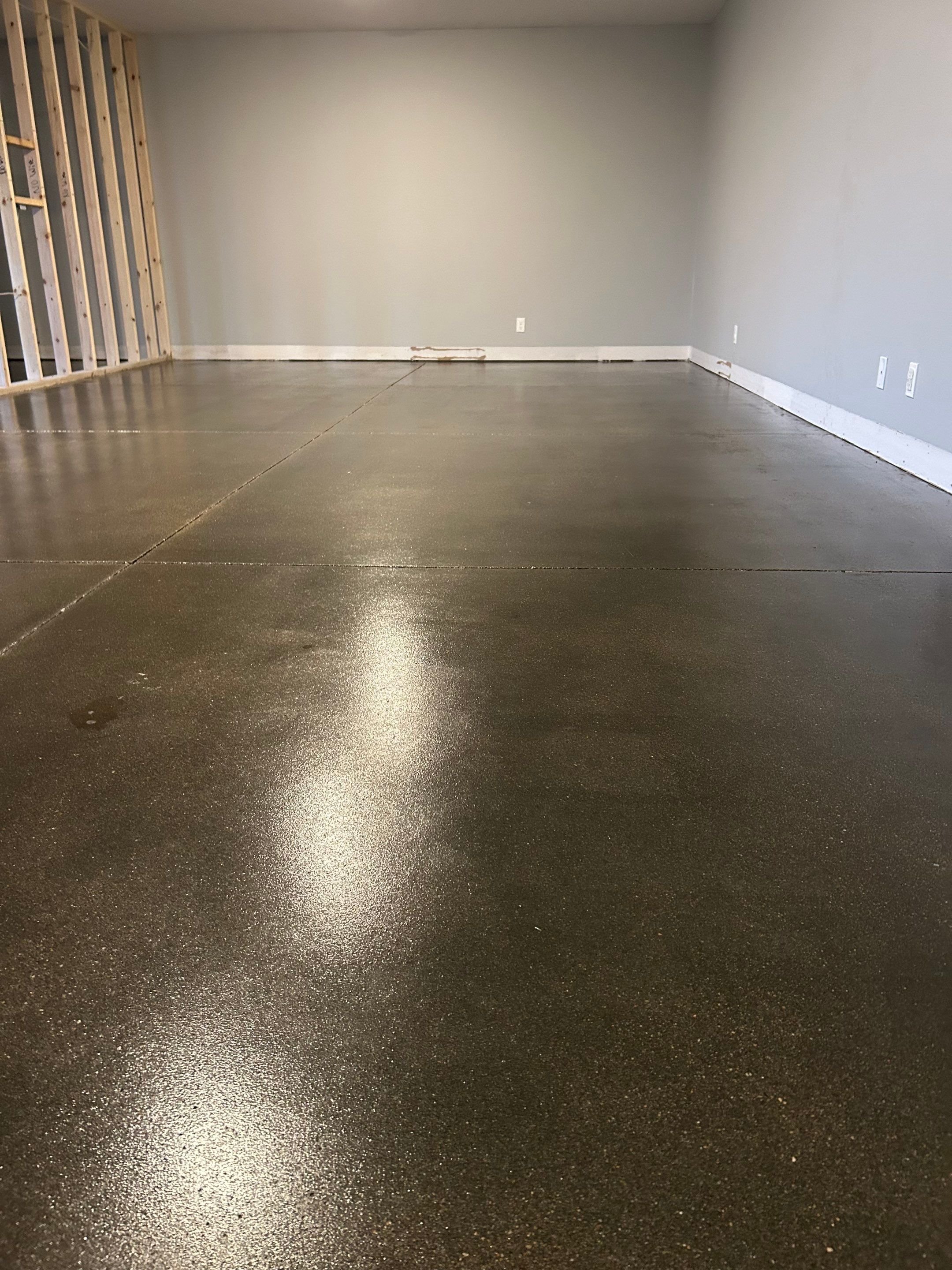 Industrial Basement Renovation! by Revival Concrete Coatings, LLC